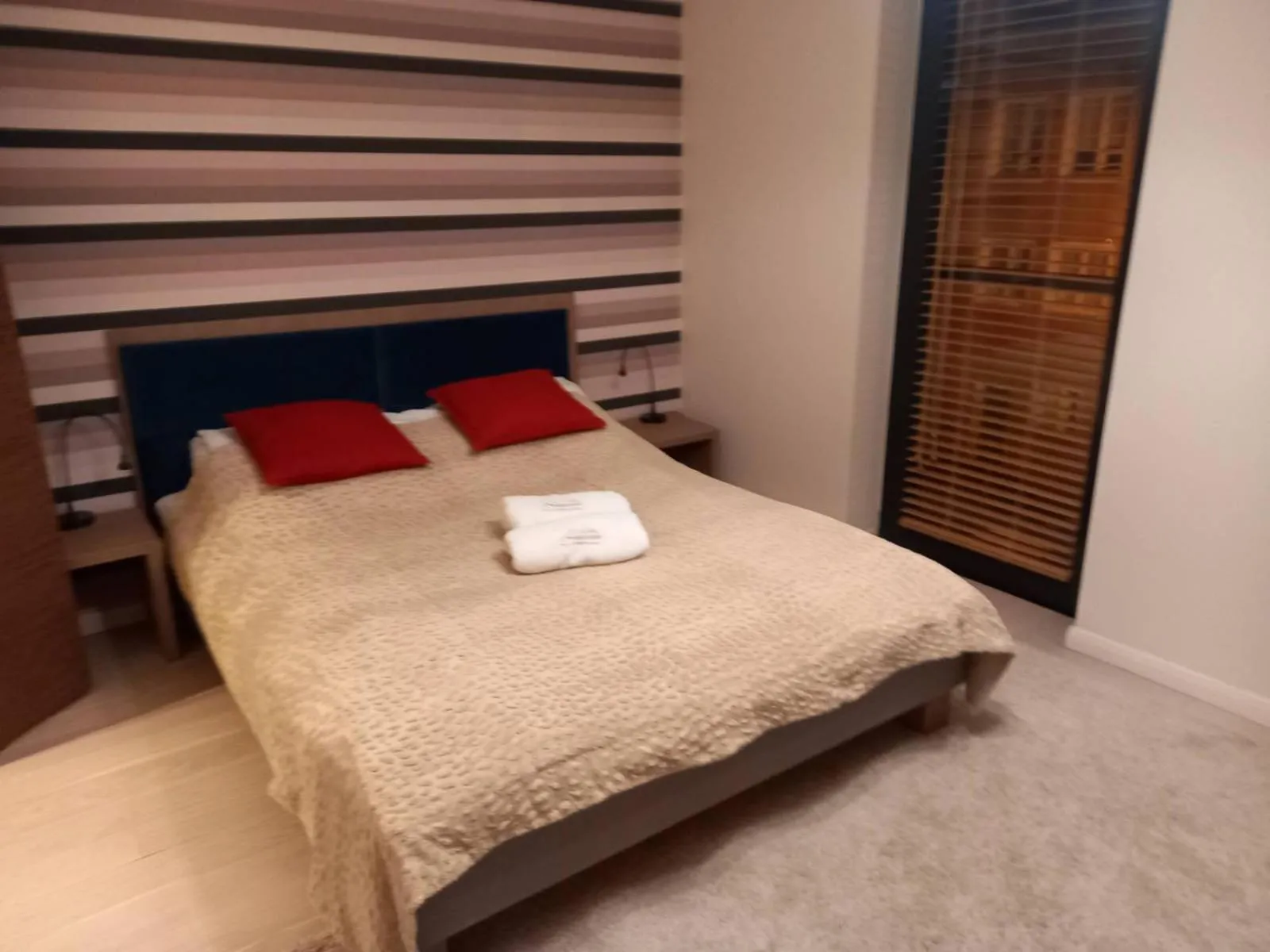 Bed in Apartment with an Amazing View