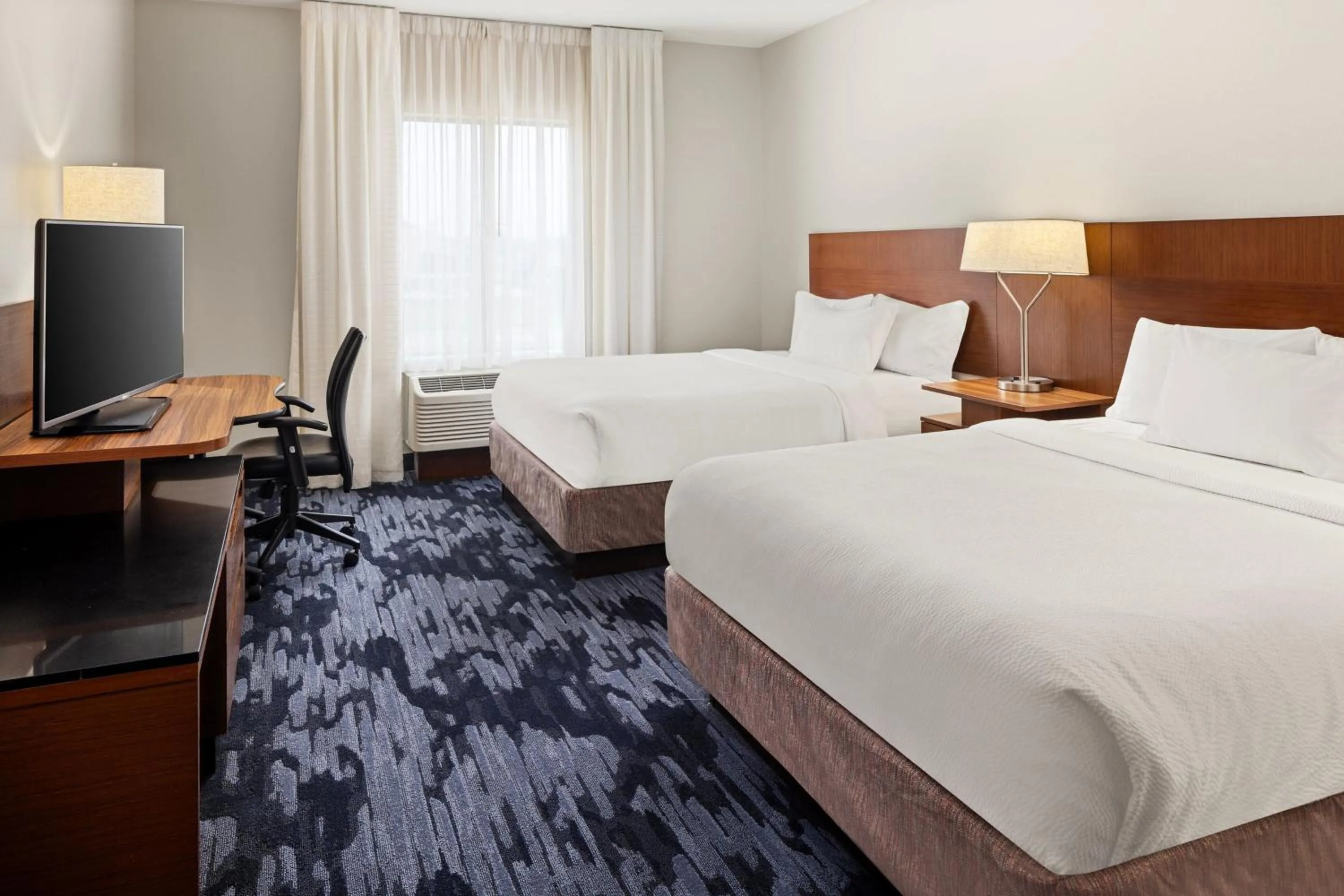 Photo of the whole room, Bed in Fairfield Inn & Suites by Marriott Waterloo Cedar Falls