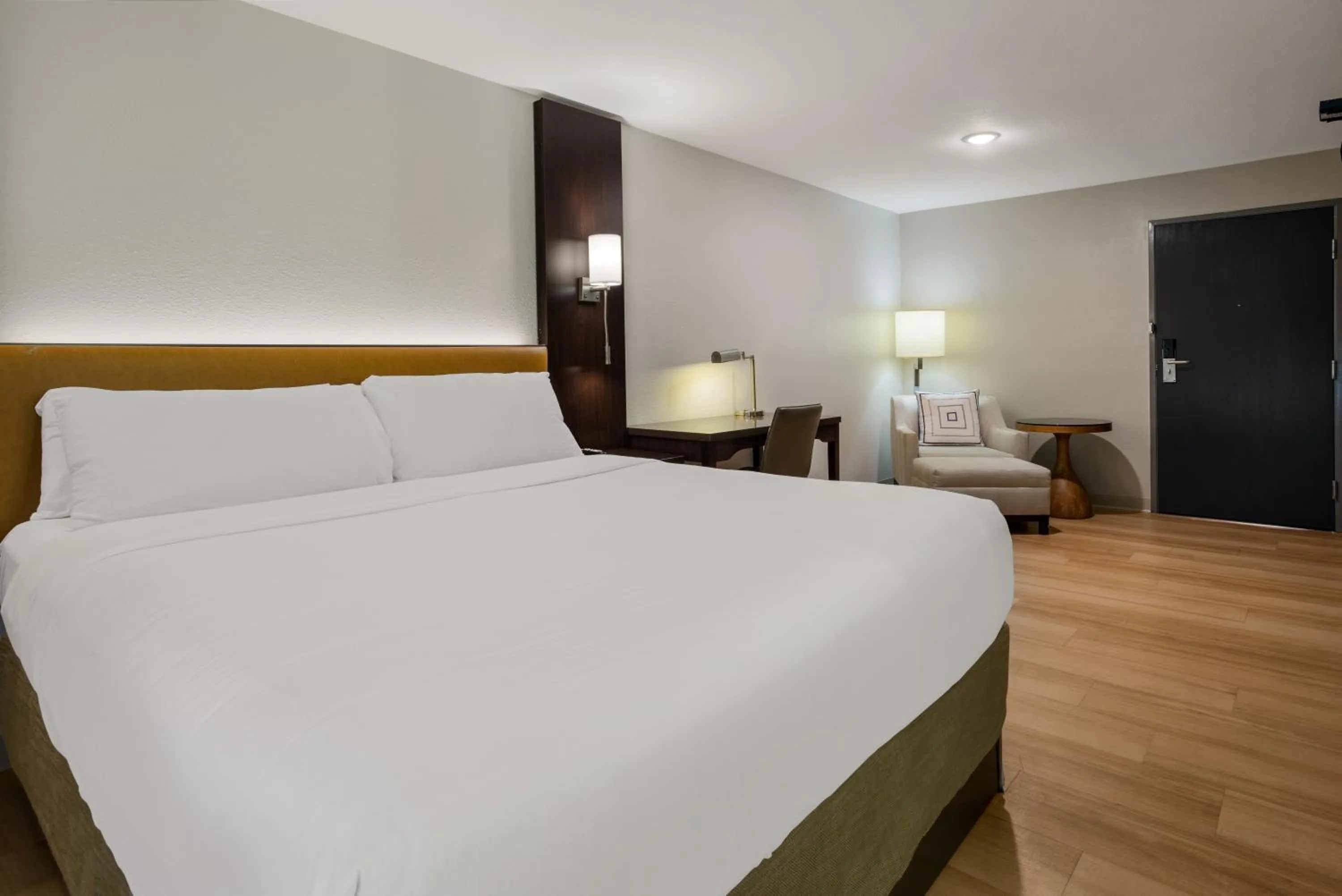 Bed in The Marco Hotel Lake Charles