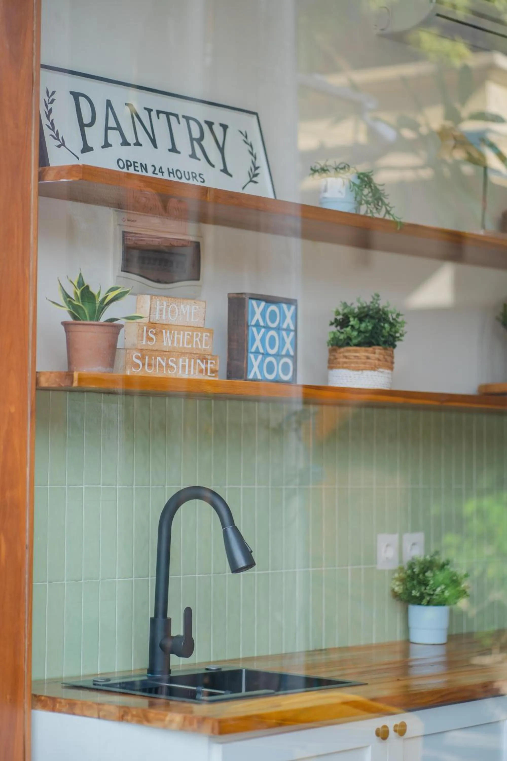 Communal kitchen in Alba Inn Sanur by SooBali