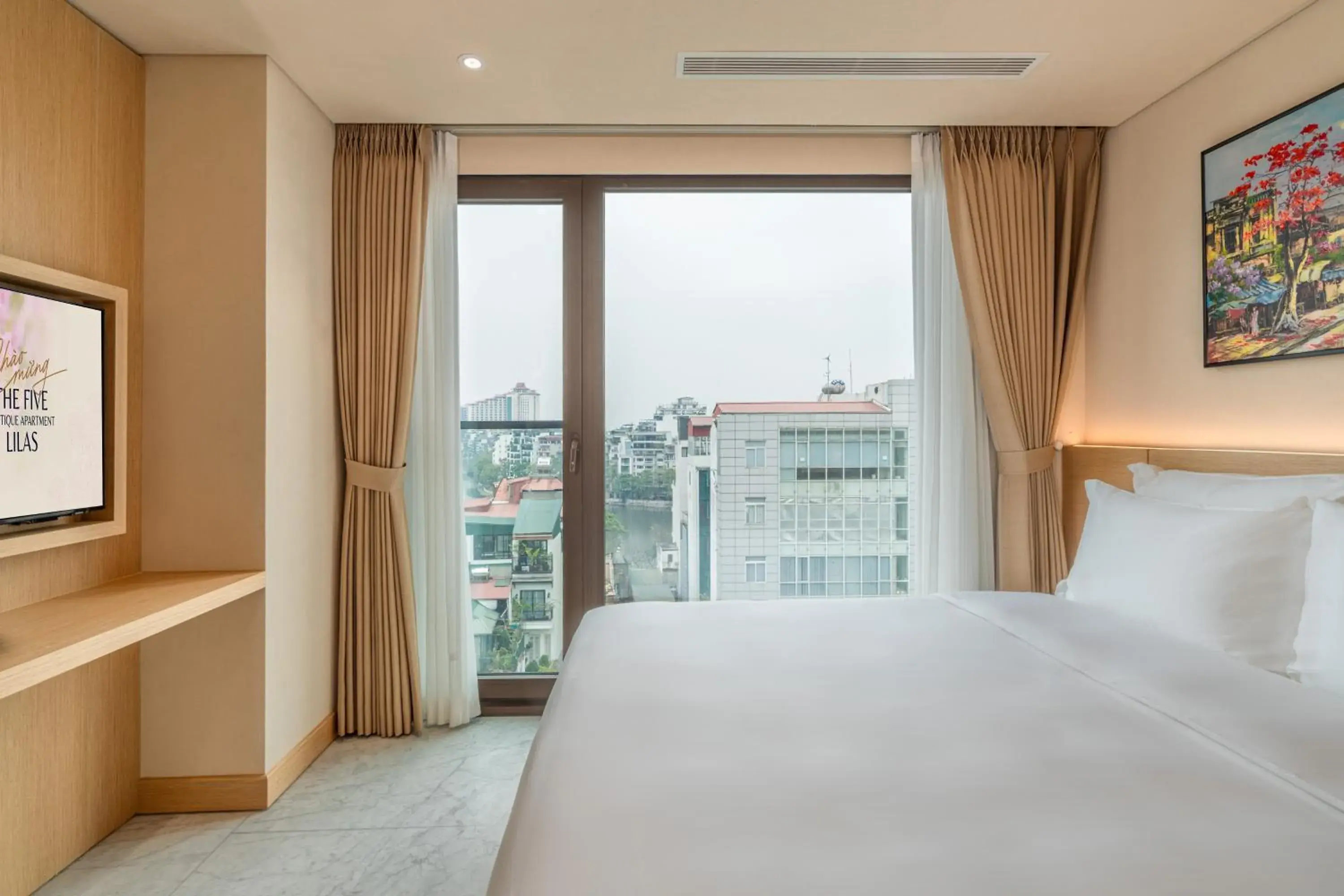 Bed in The Five Suites Lilas Bed in The Five Suites Lilas