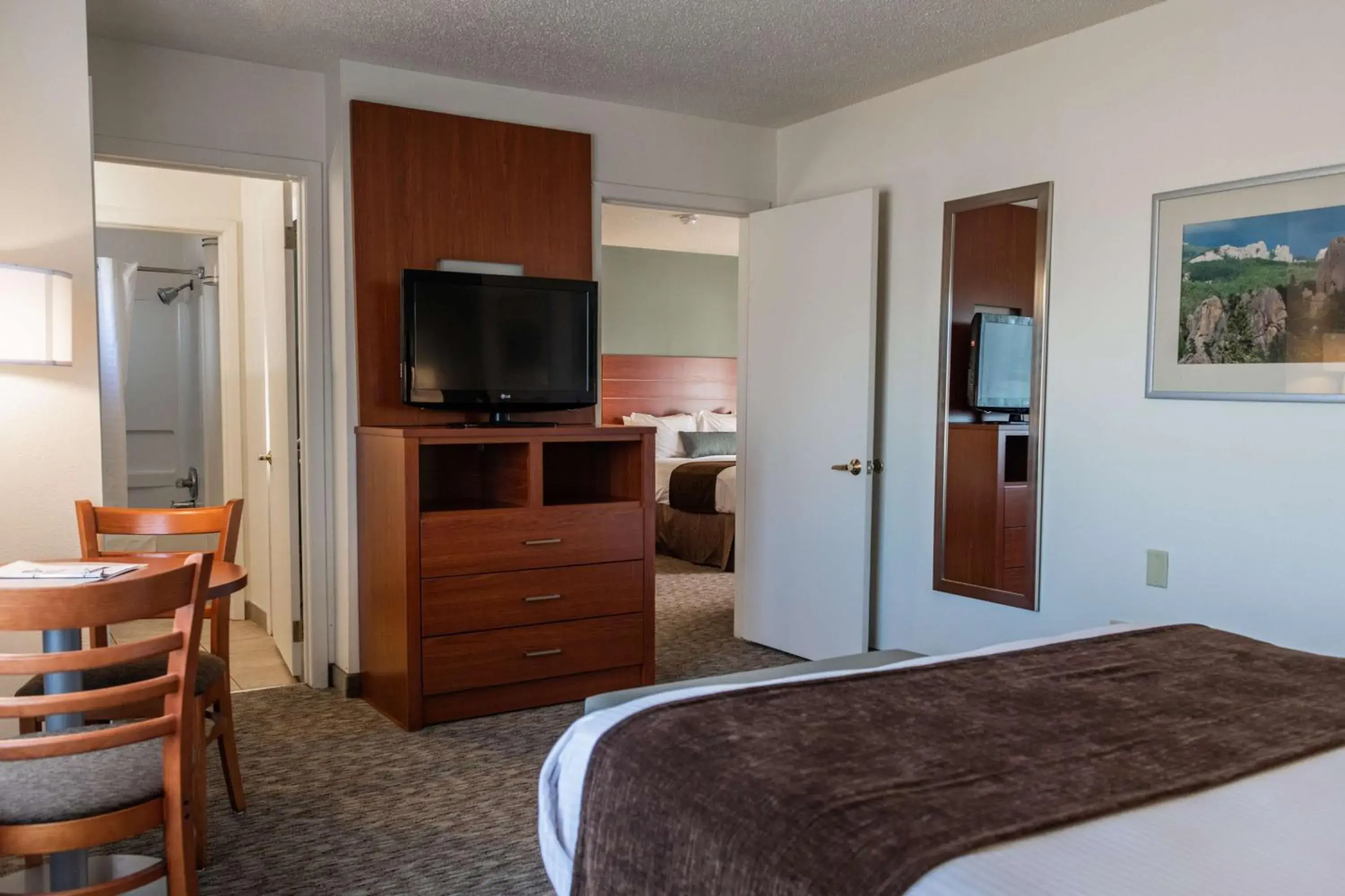 Photo of the whole room, TV/Entertainment Center in Best Western Buffalo Ridge Inn