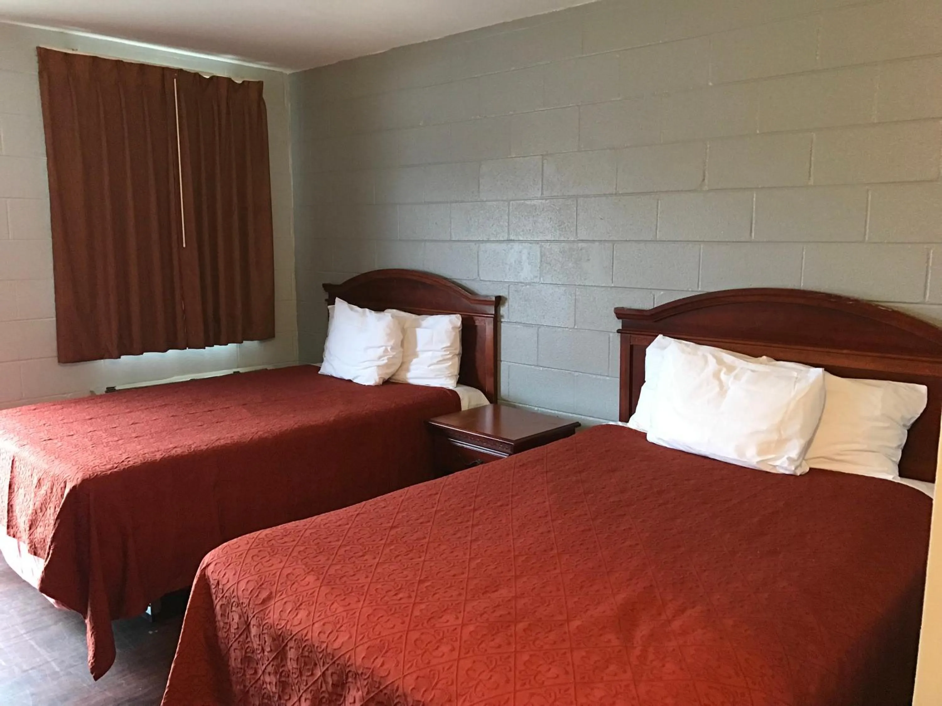 Bed in Sky Inn Hotel