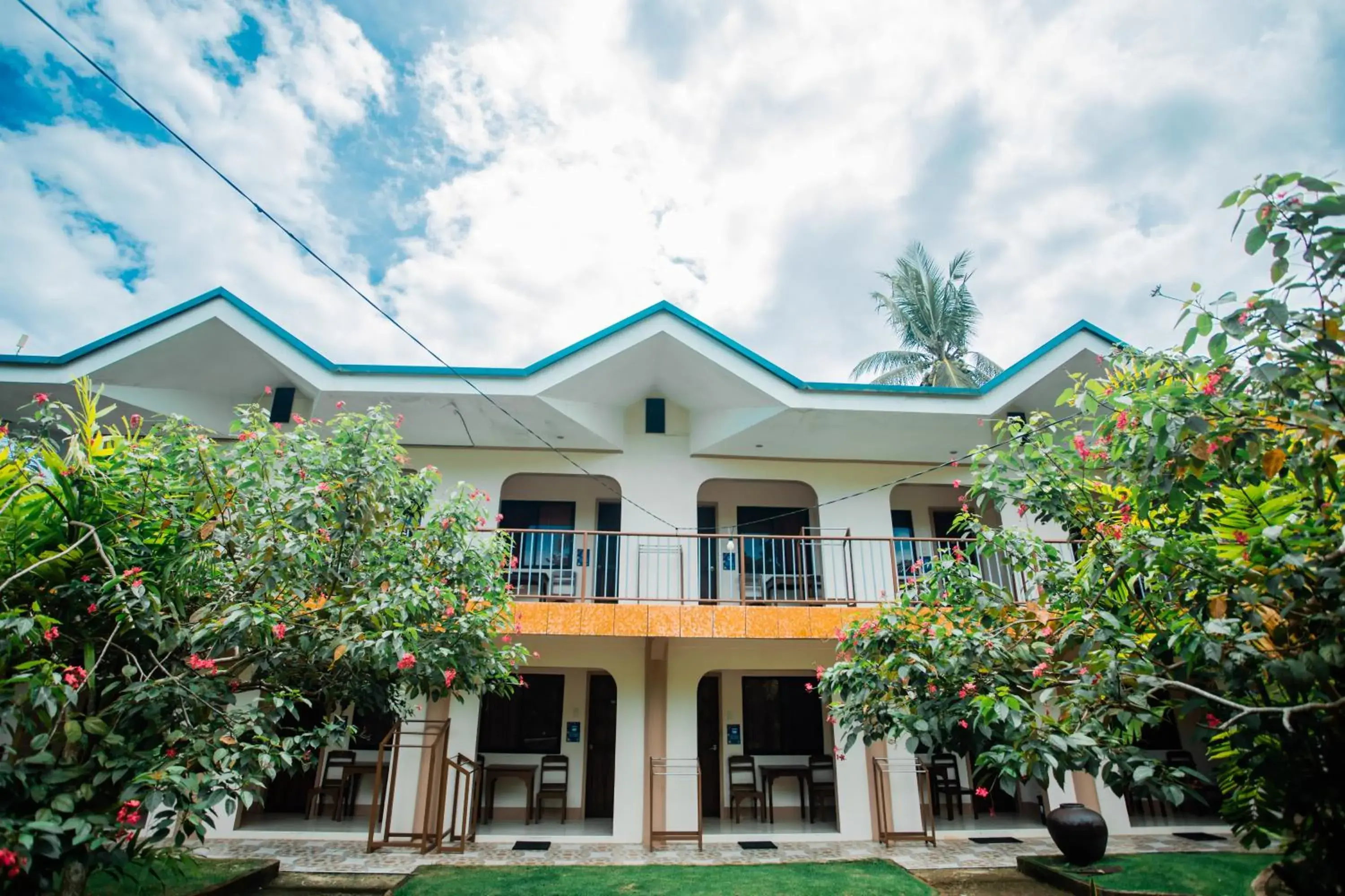 Property building in Durhan White Beach Resort powered by Cocotel Property building in Durhan White Beach Resort powered by Cocotel