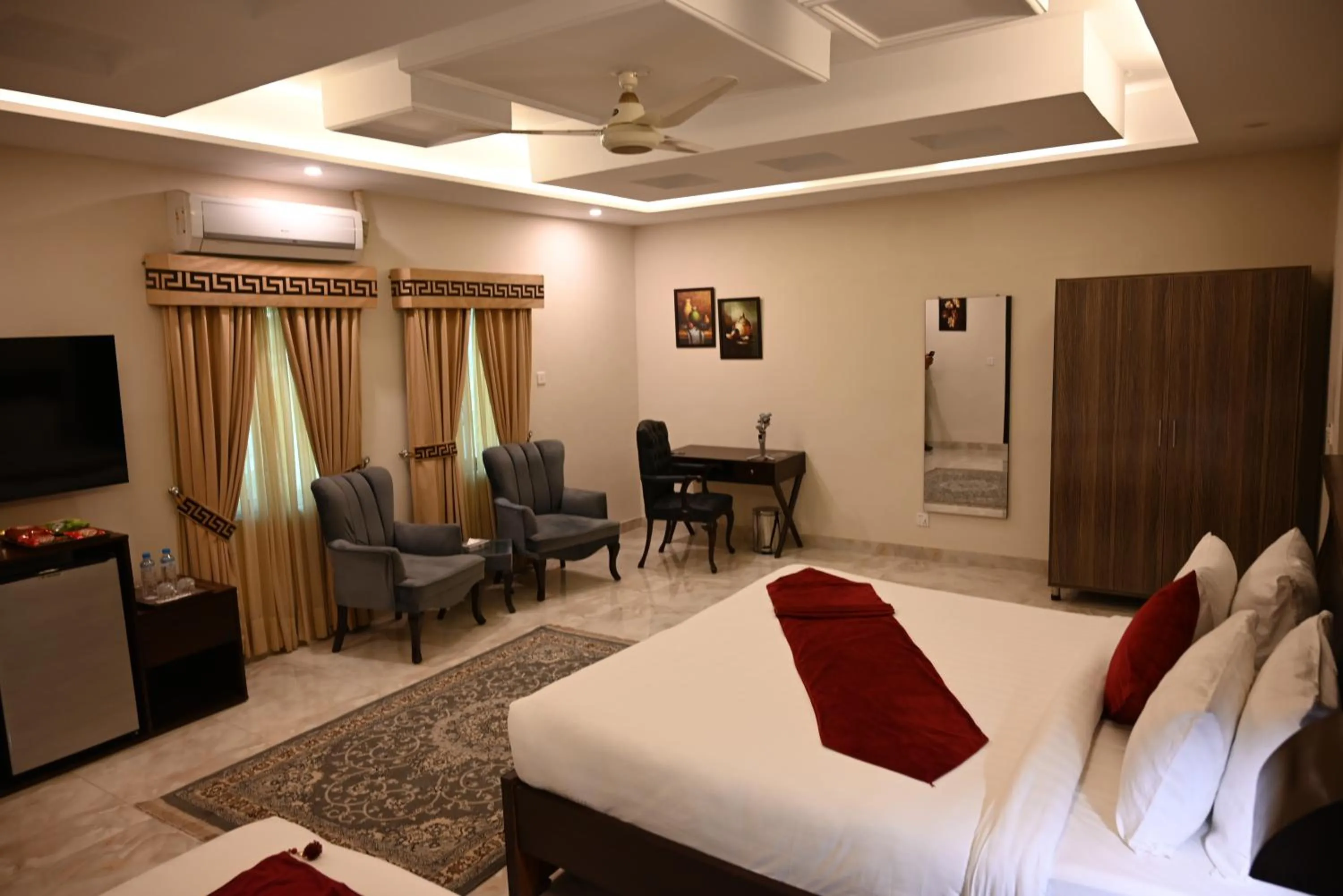 Photo of the whole room, Bed in Burj Ul Zaki