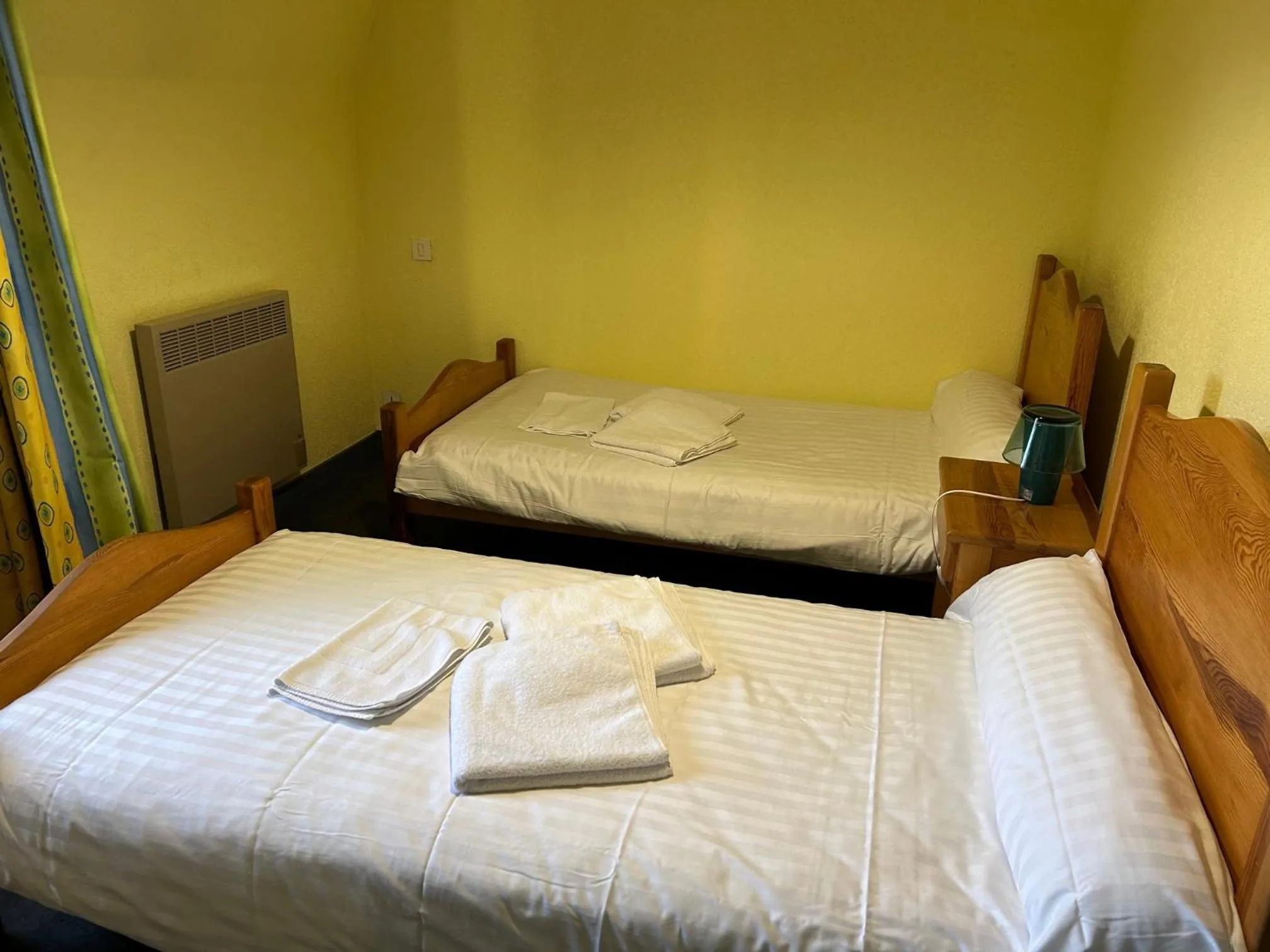 Bed in AUX GLOBE-TROTTERS