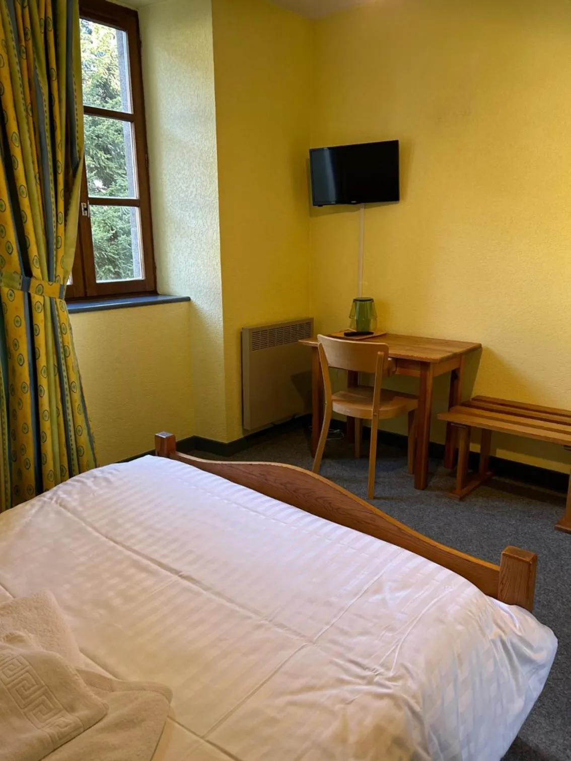 Bed in AUX GLOBE-TROTTERS