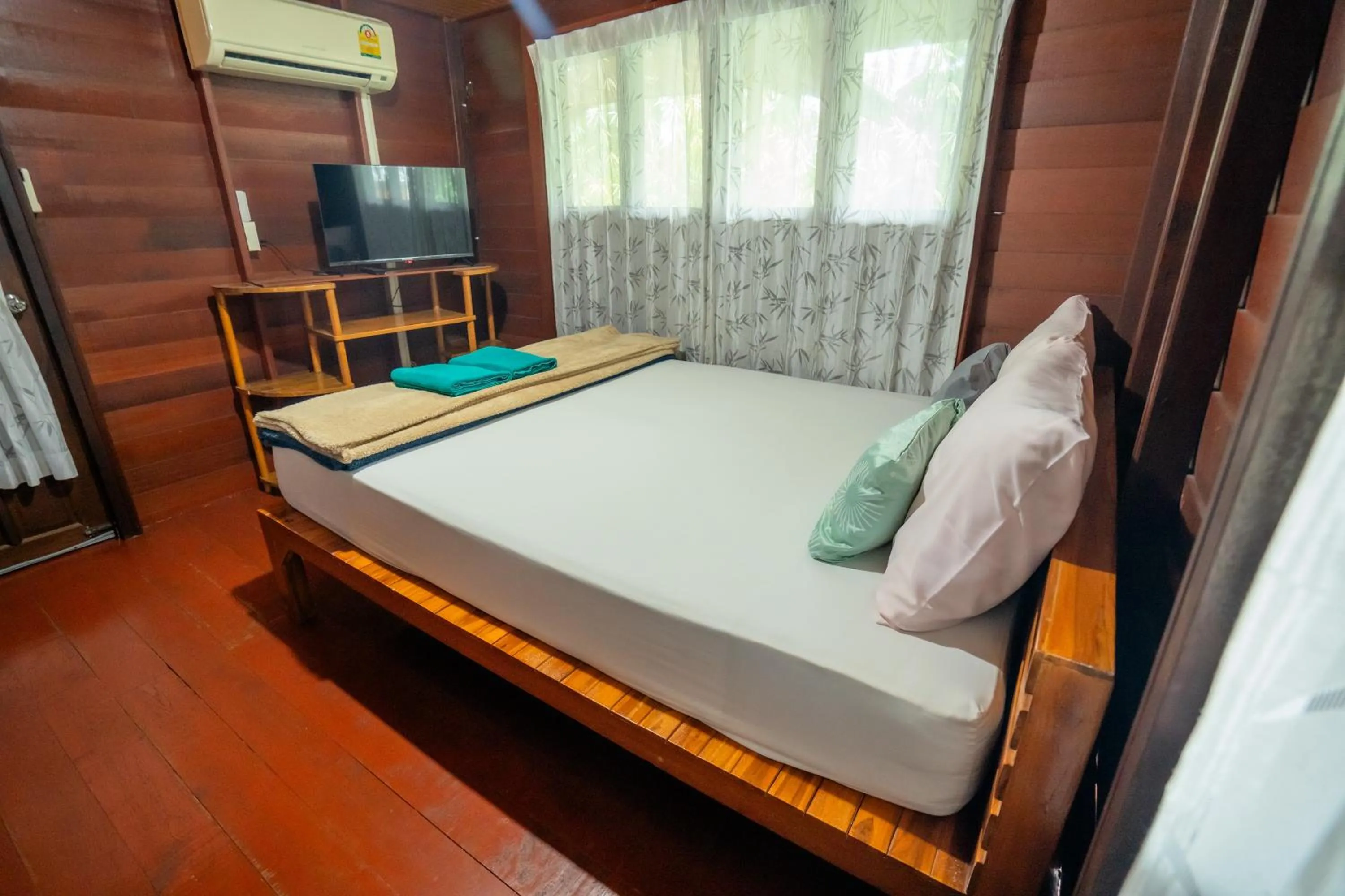 Bed in Ban Suan Bang Toei Homestay