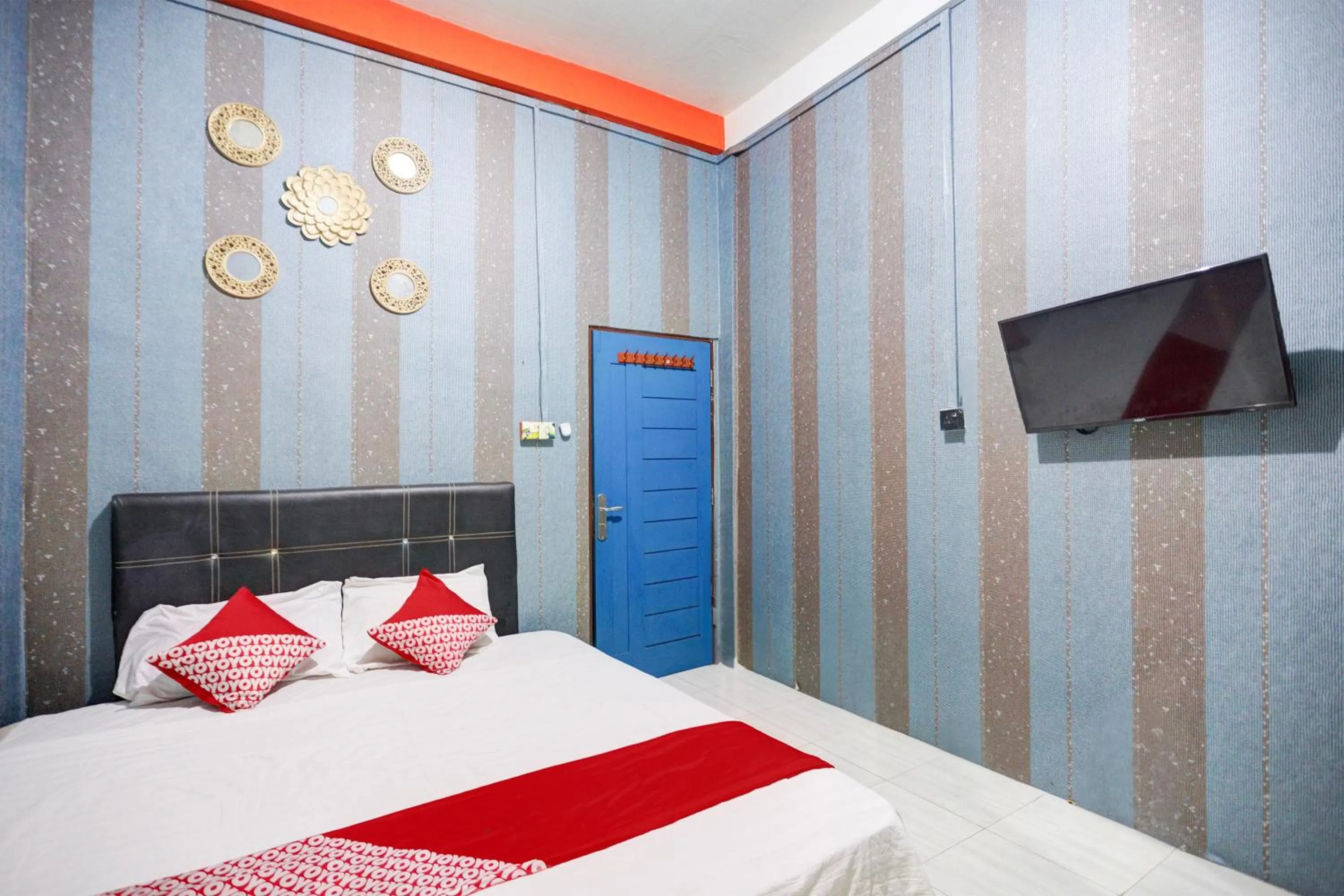 Bedroom, Bed in Hotel O Penginapan Pelangi