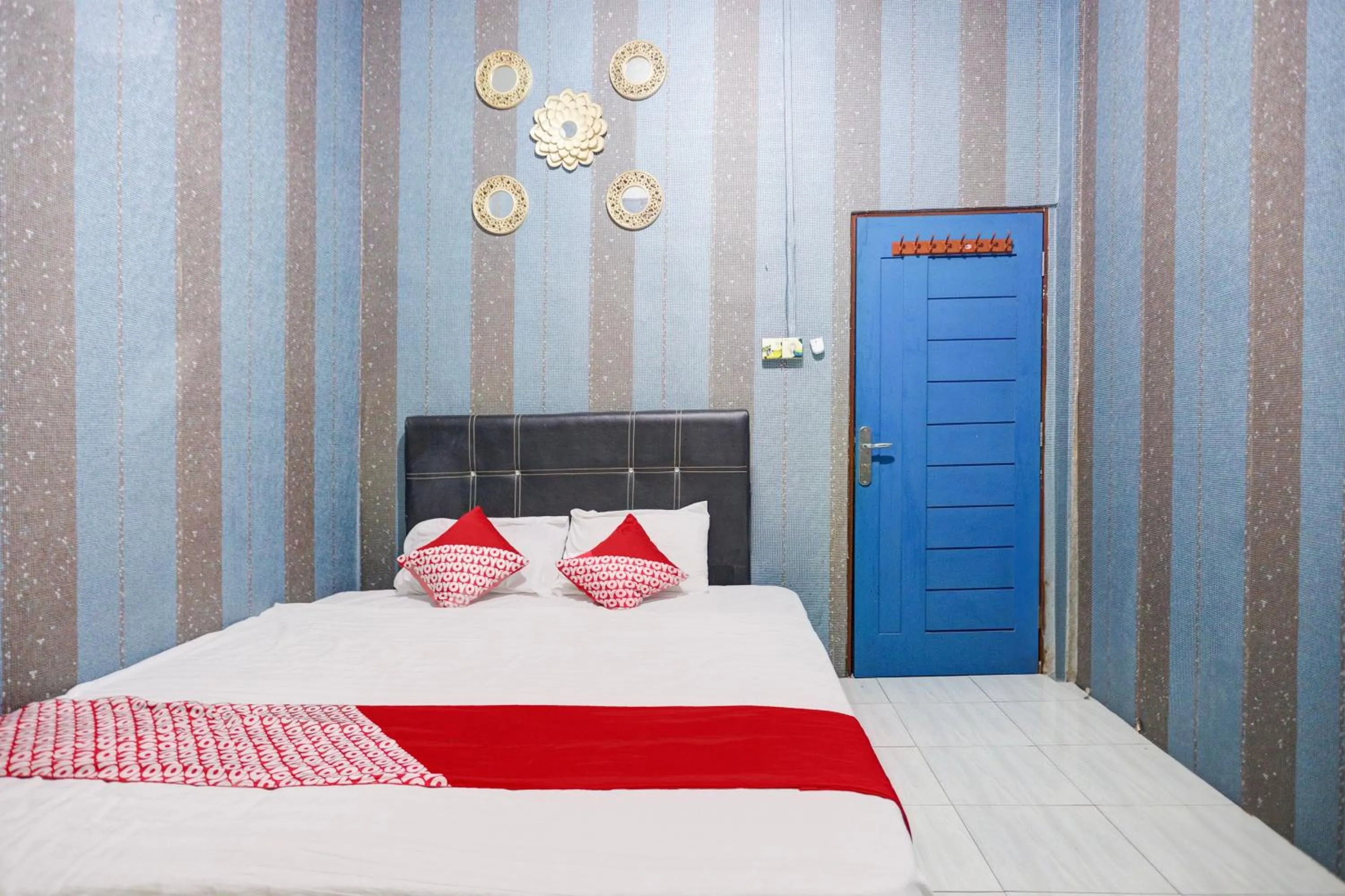 Bedroom, Bed in Hotel O Penginapan Pelangi