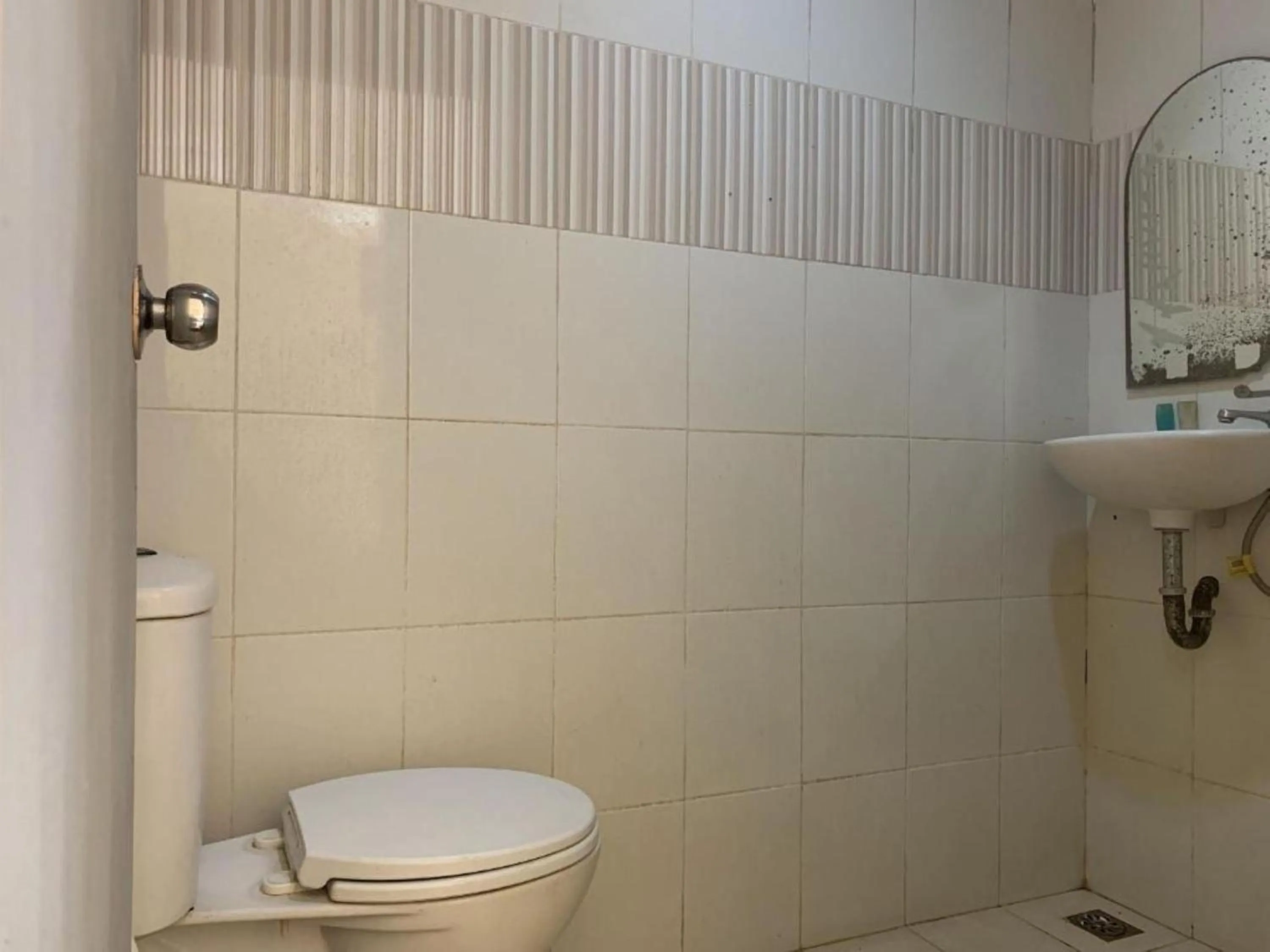 Bathroom in OYO 93628 Scorpion Guest House & Beach