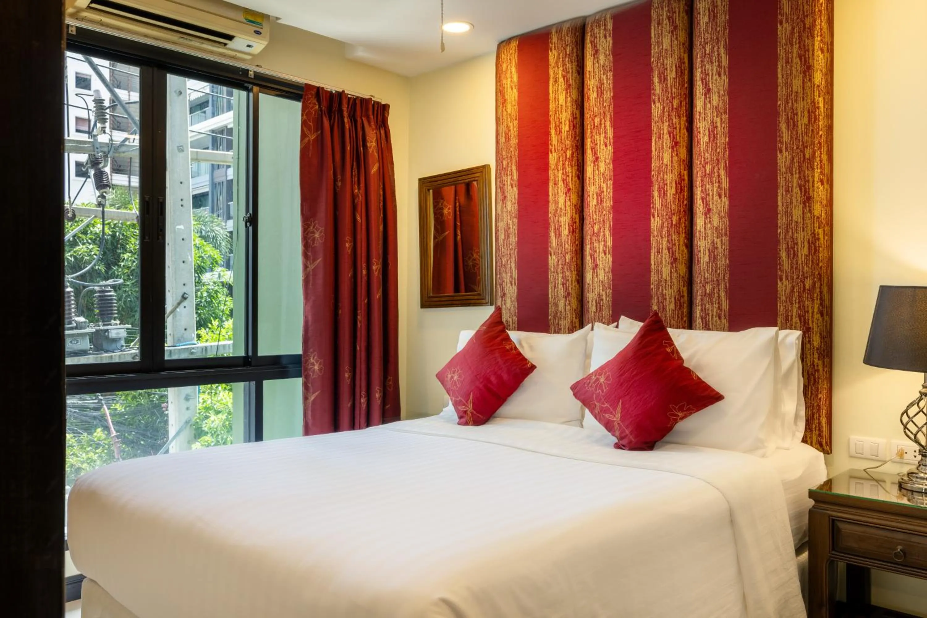 Bed in Citismart Luxury Apartments