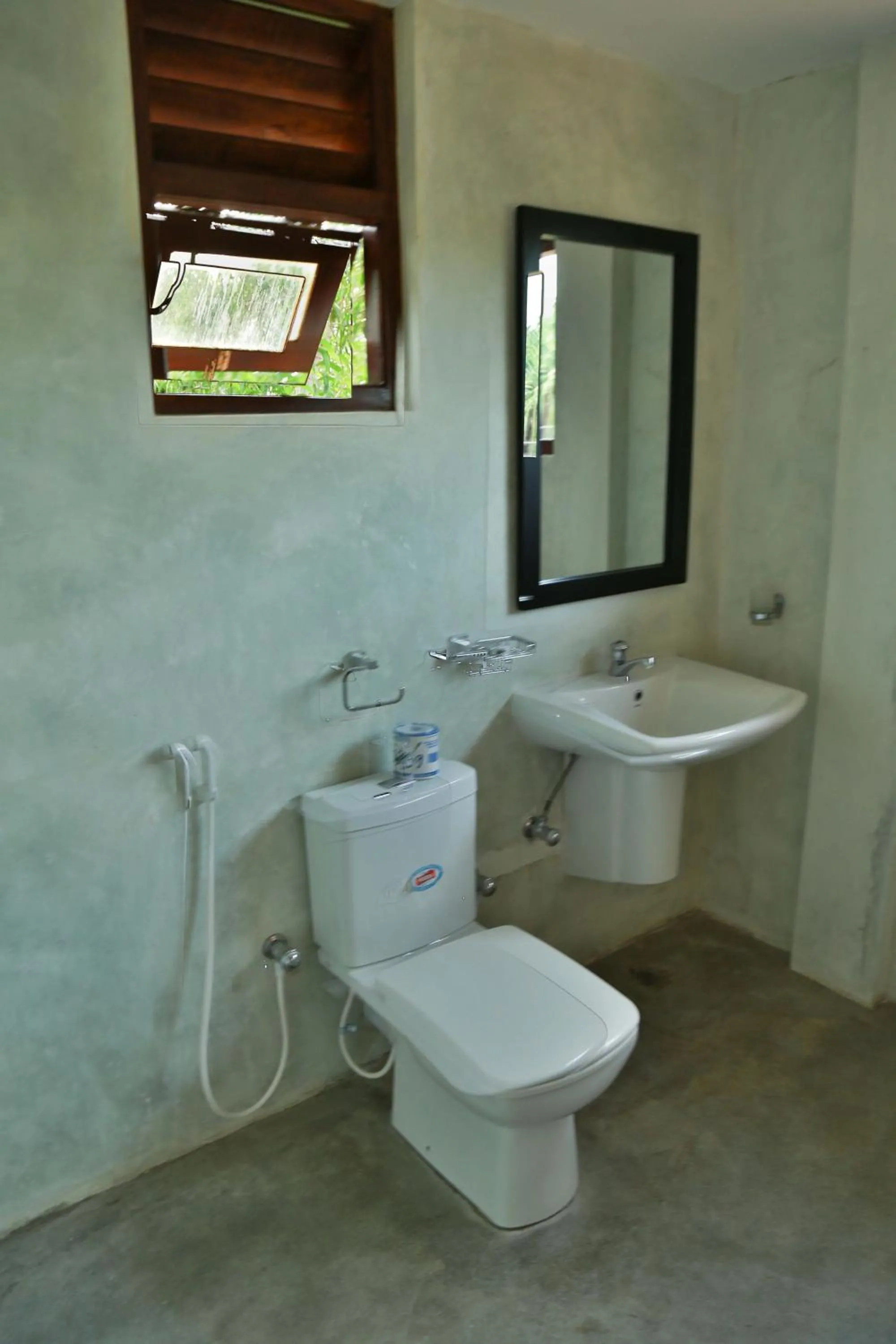 Toilet in Ganesh Garden Beach Cabanas