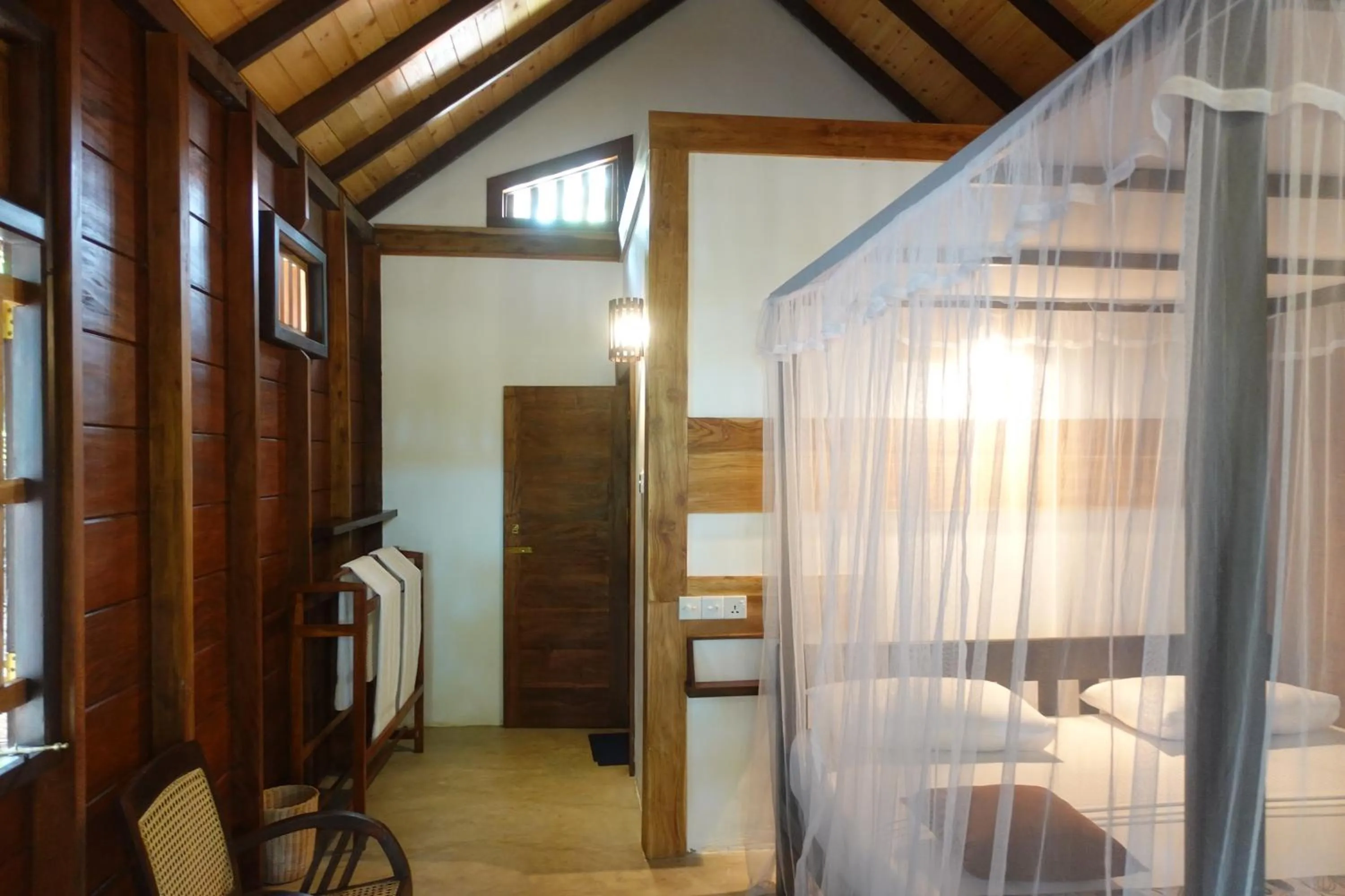 Bed in Ganesh Garden Beach Cabanas