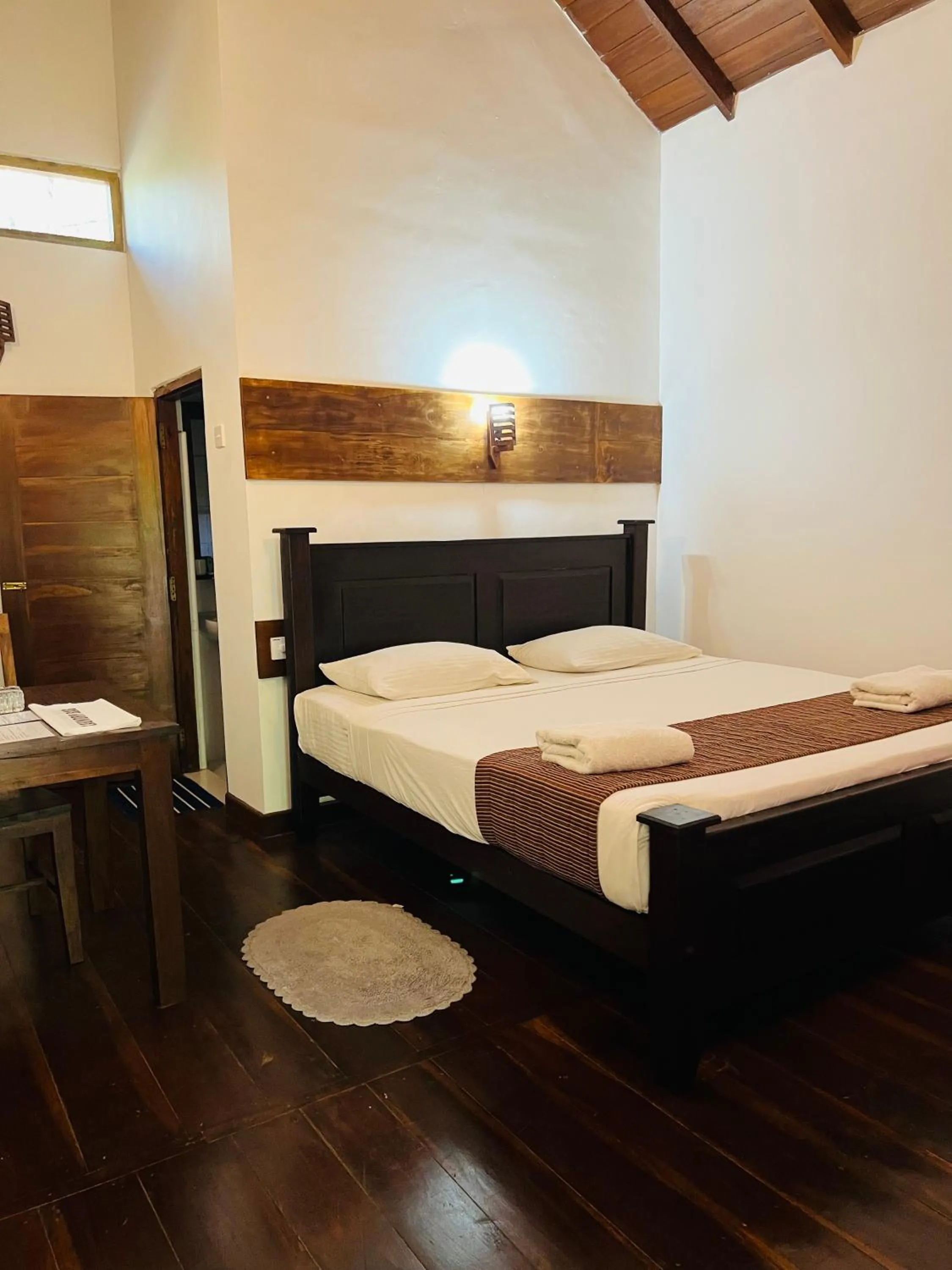 Bed in Ganesh Garden Beach Cabanas