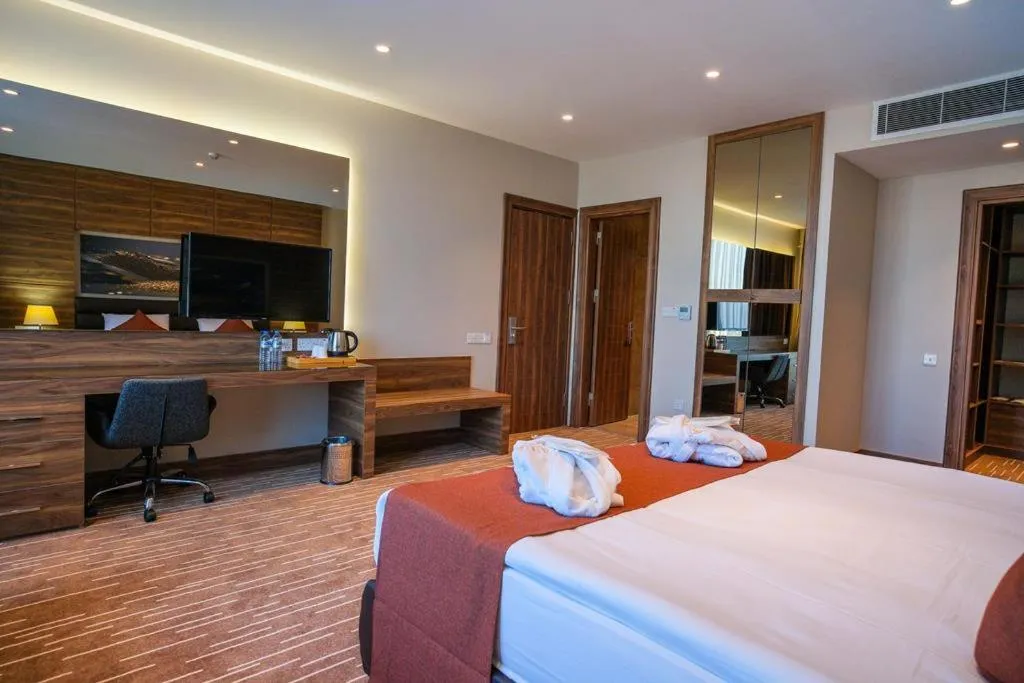 Bed in Ekor Elegance Hotel