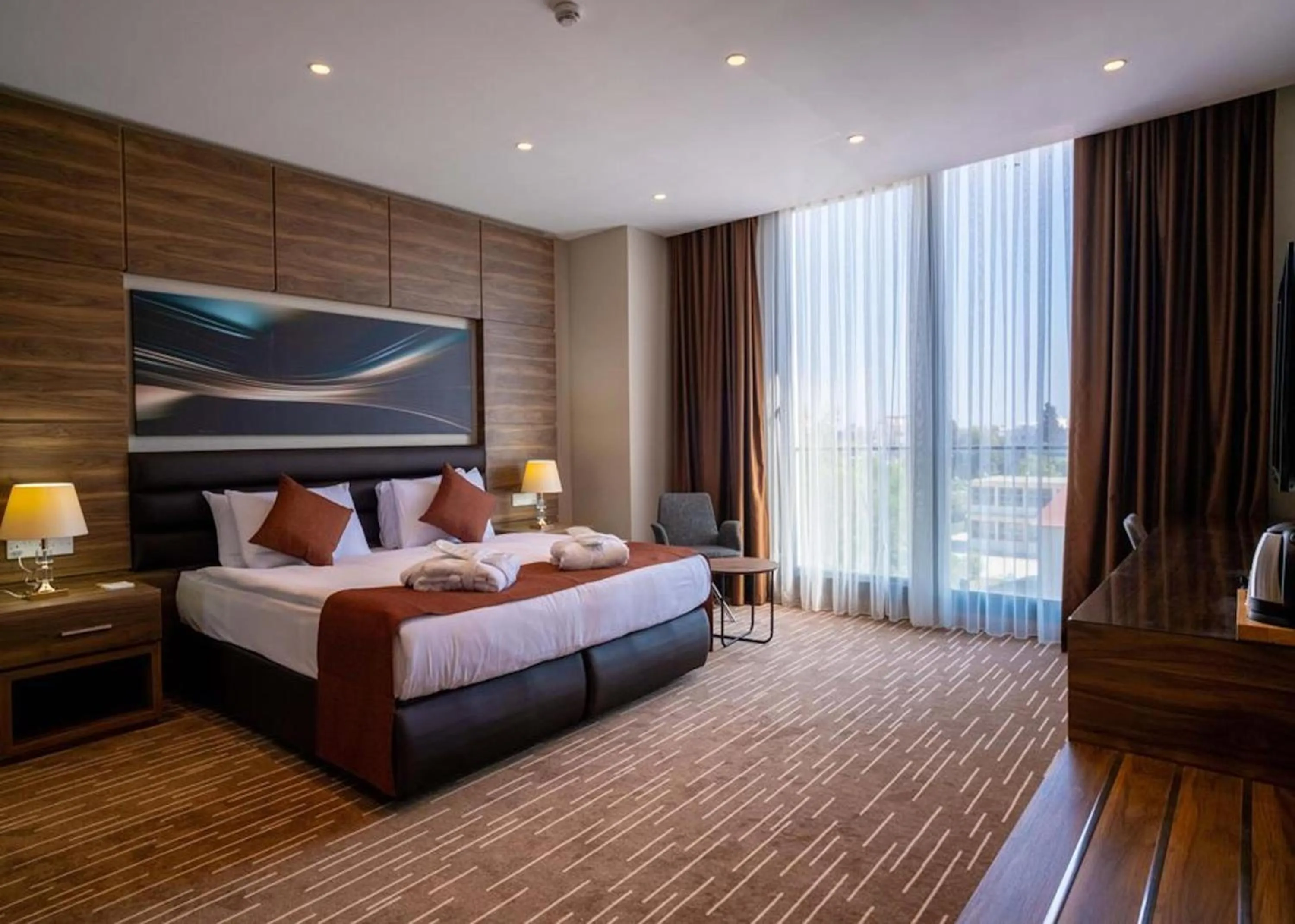 Bed in Ekor Elegance Hotel