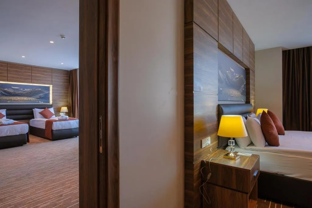 Bed in Ekor Elegance Hotel