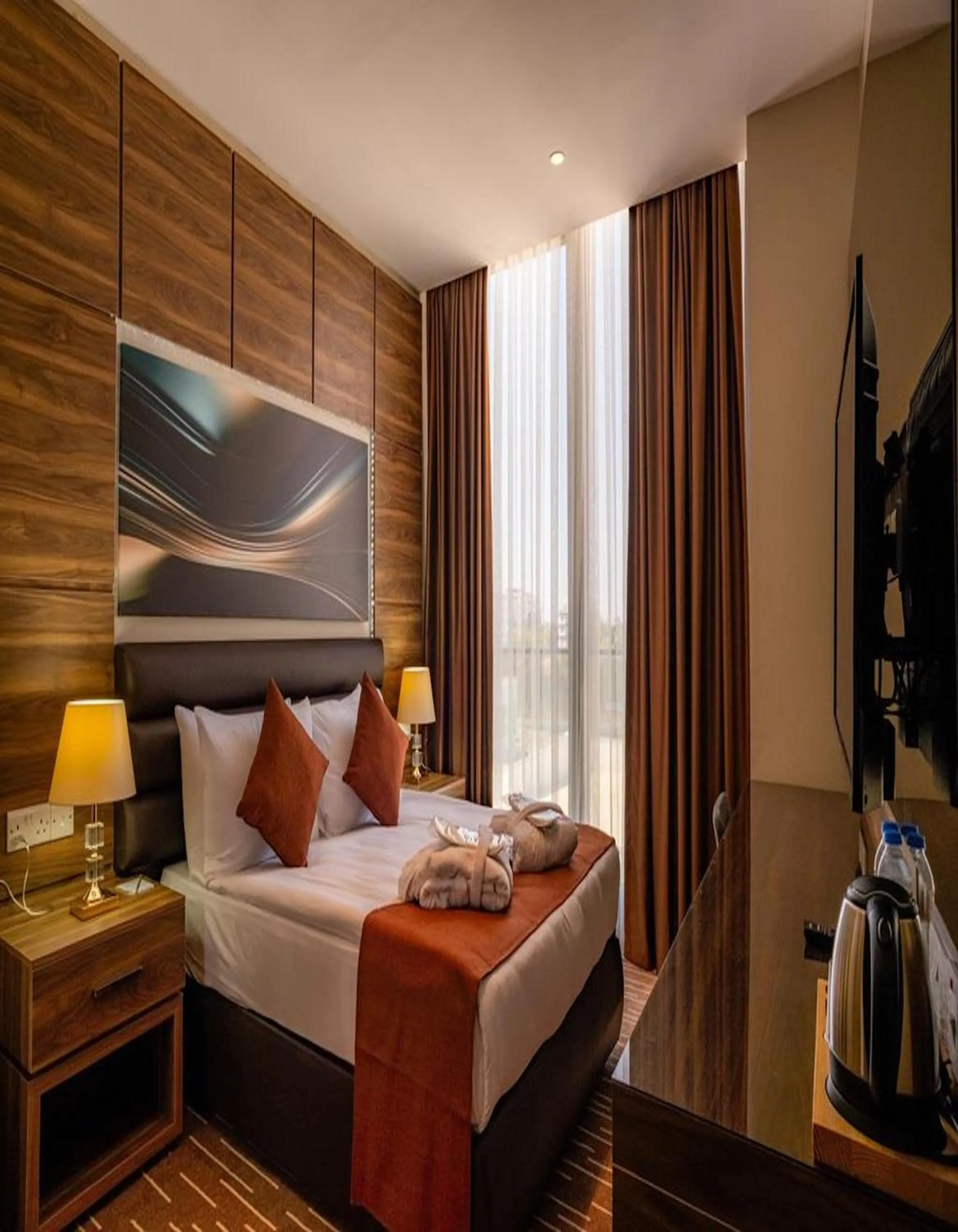 Bed in Ekor Elegance Hotel