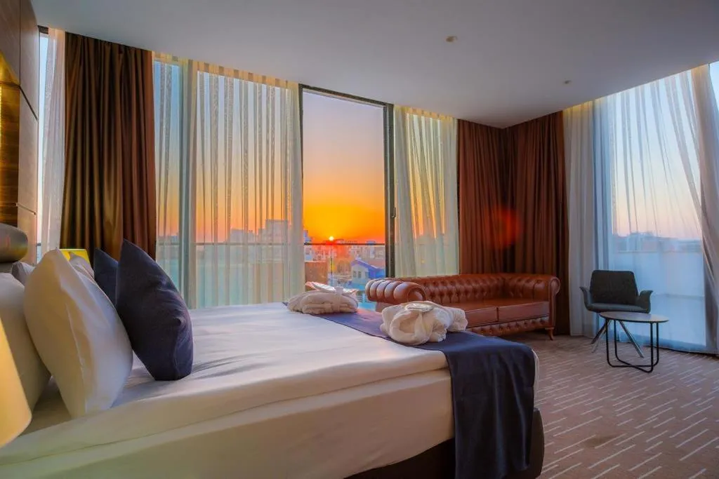 Bed in Ekor Elegance Hotel