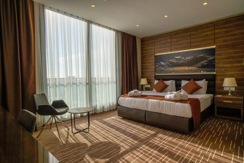 Bed in Ekor Elegance Hotel