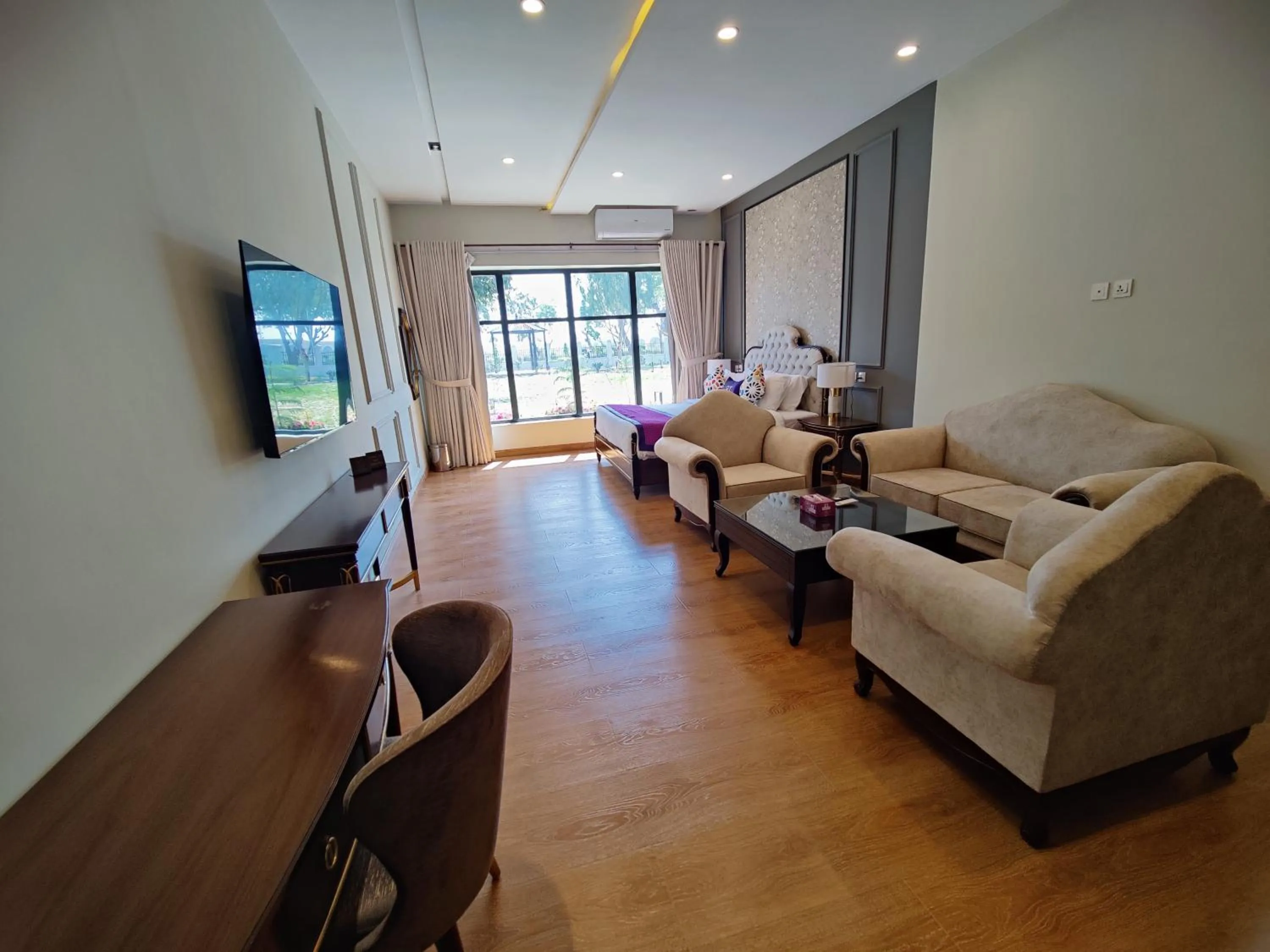 Photo of the whole room in RT Grace Royal Taj Hotel Sukkur