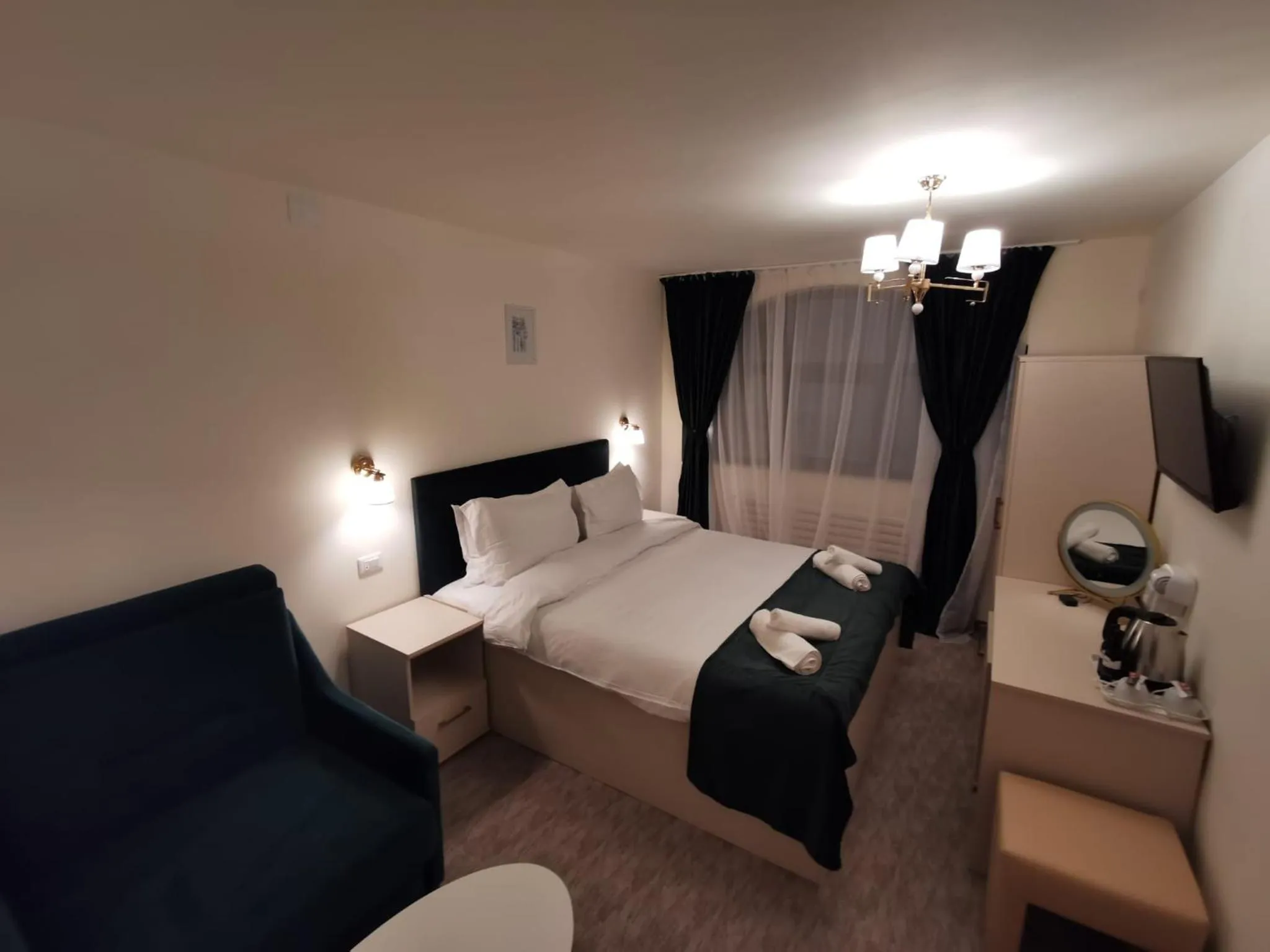 Bed in Cerbul Chalét Accommodation & Wellness