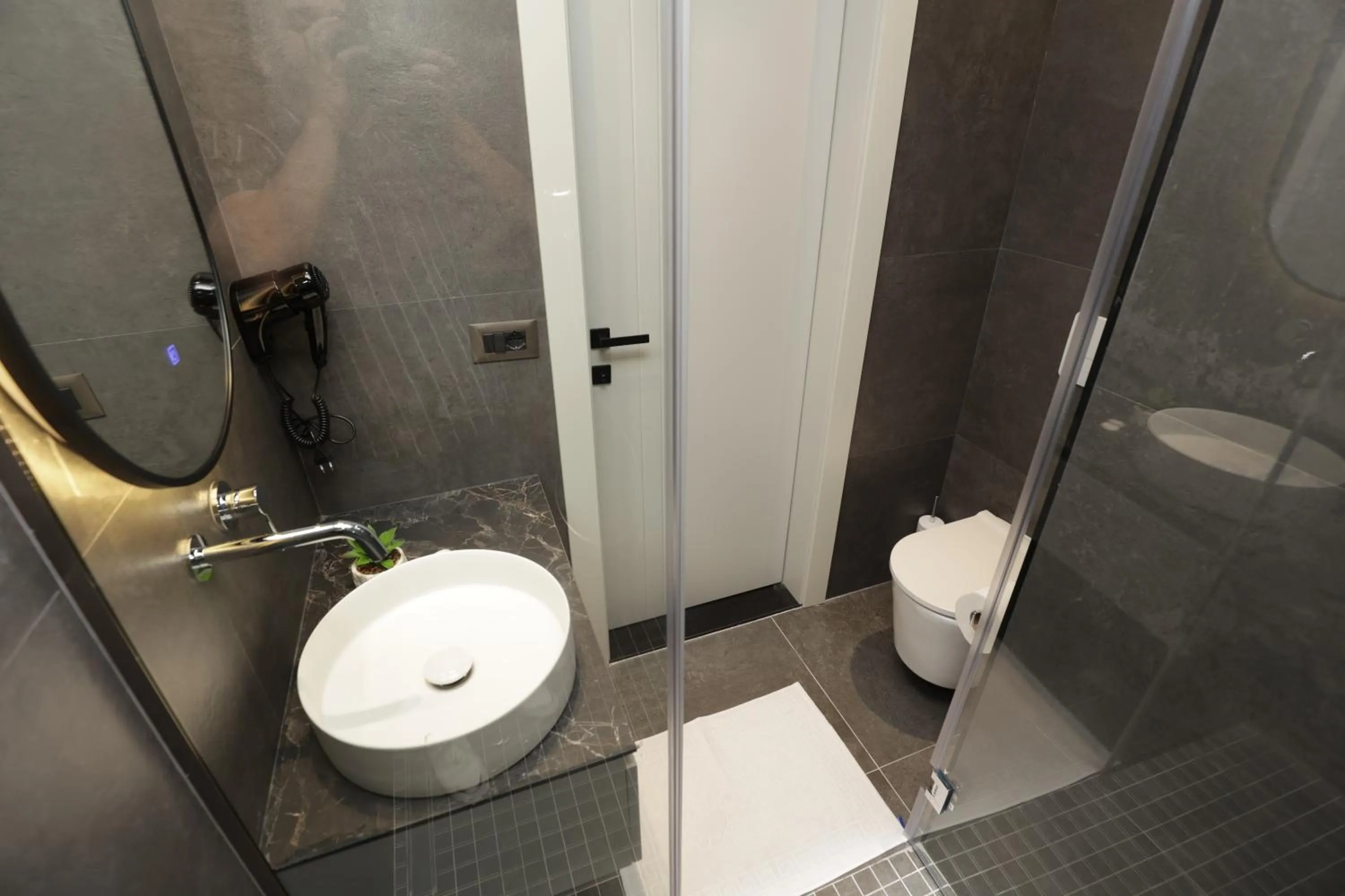 Bathroom in Gremmy Boutique Hotel