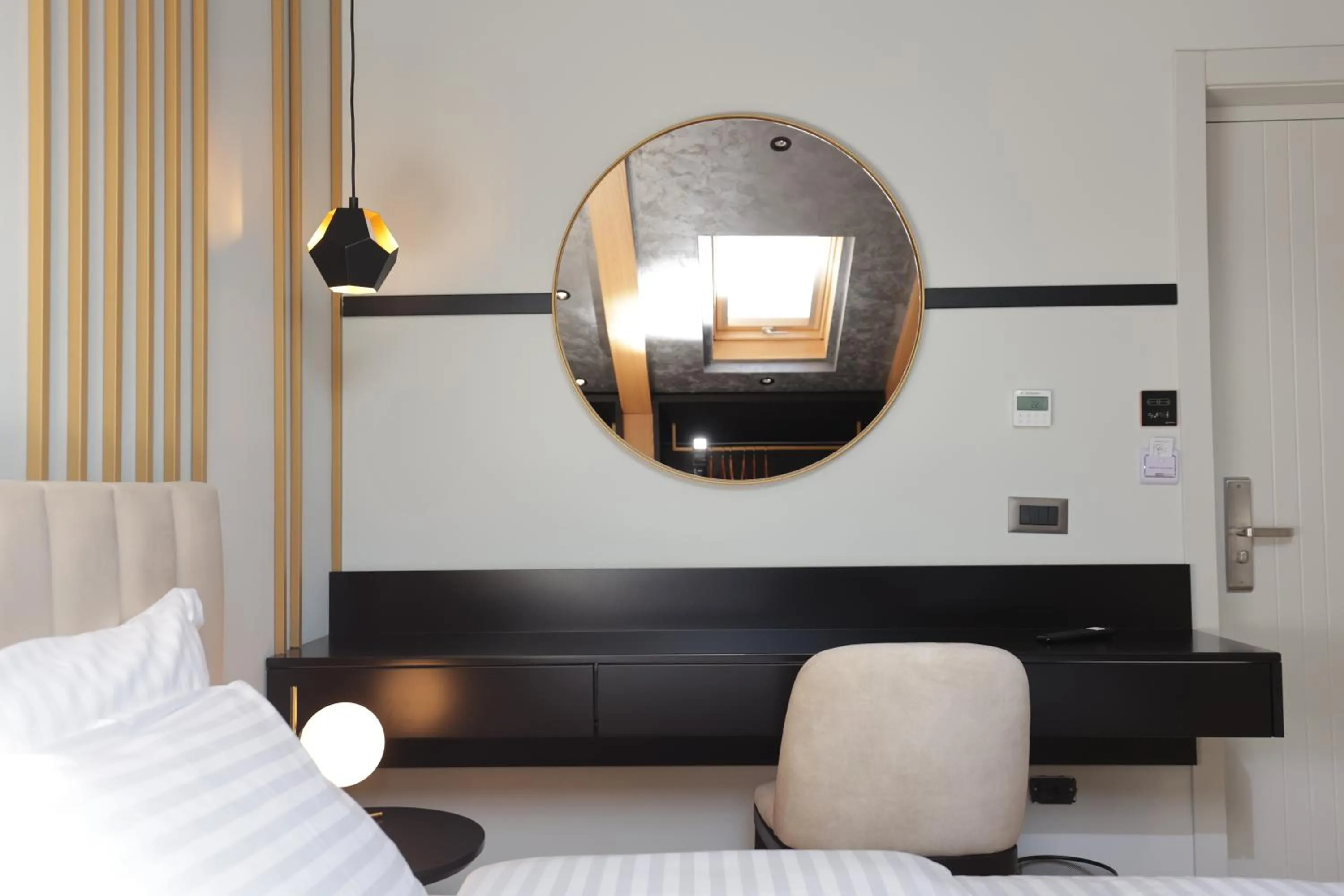 Bed in Gremmy Boutique Hotel