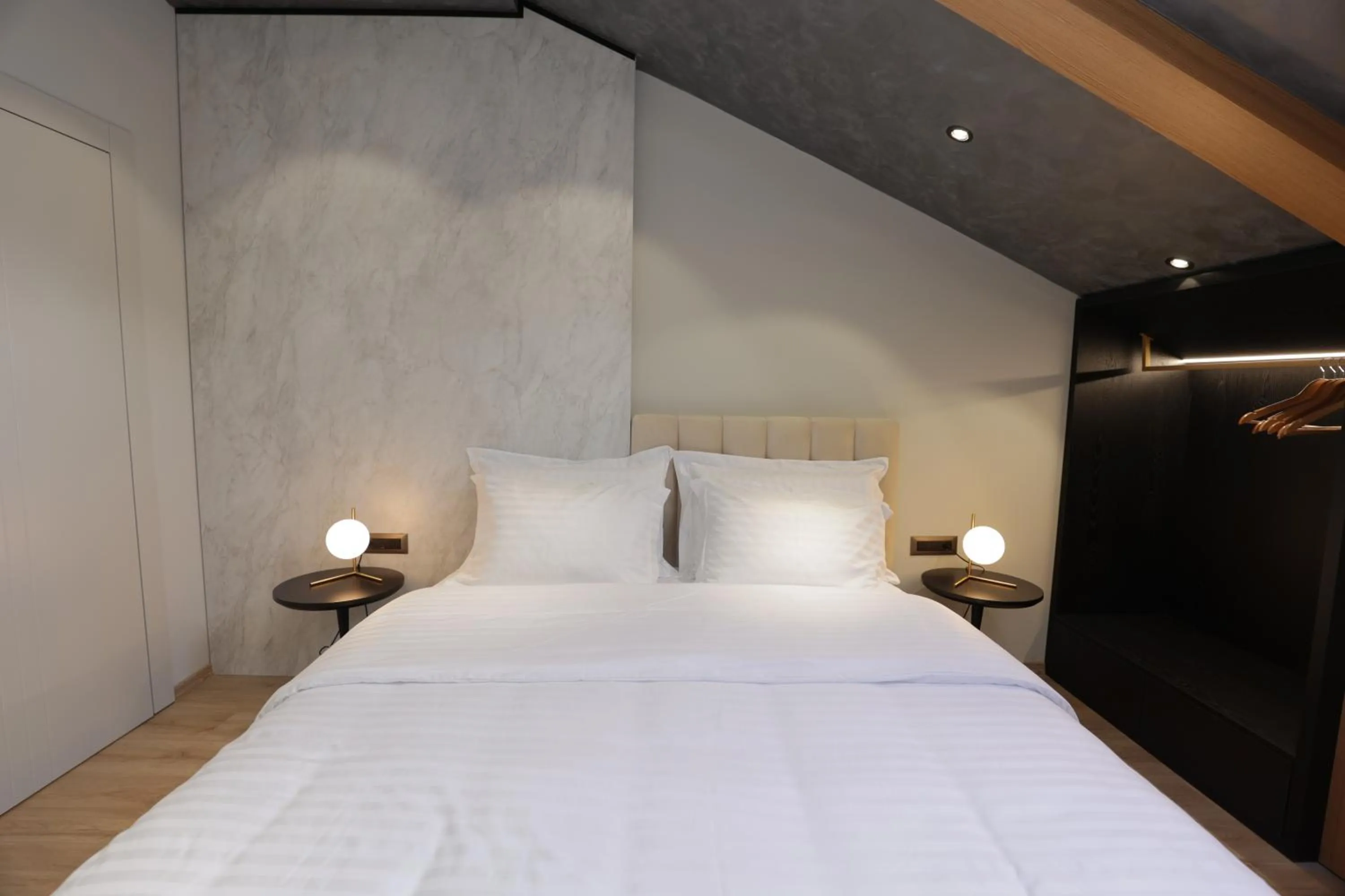 Bed in Gremmy Boutique Hotel