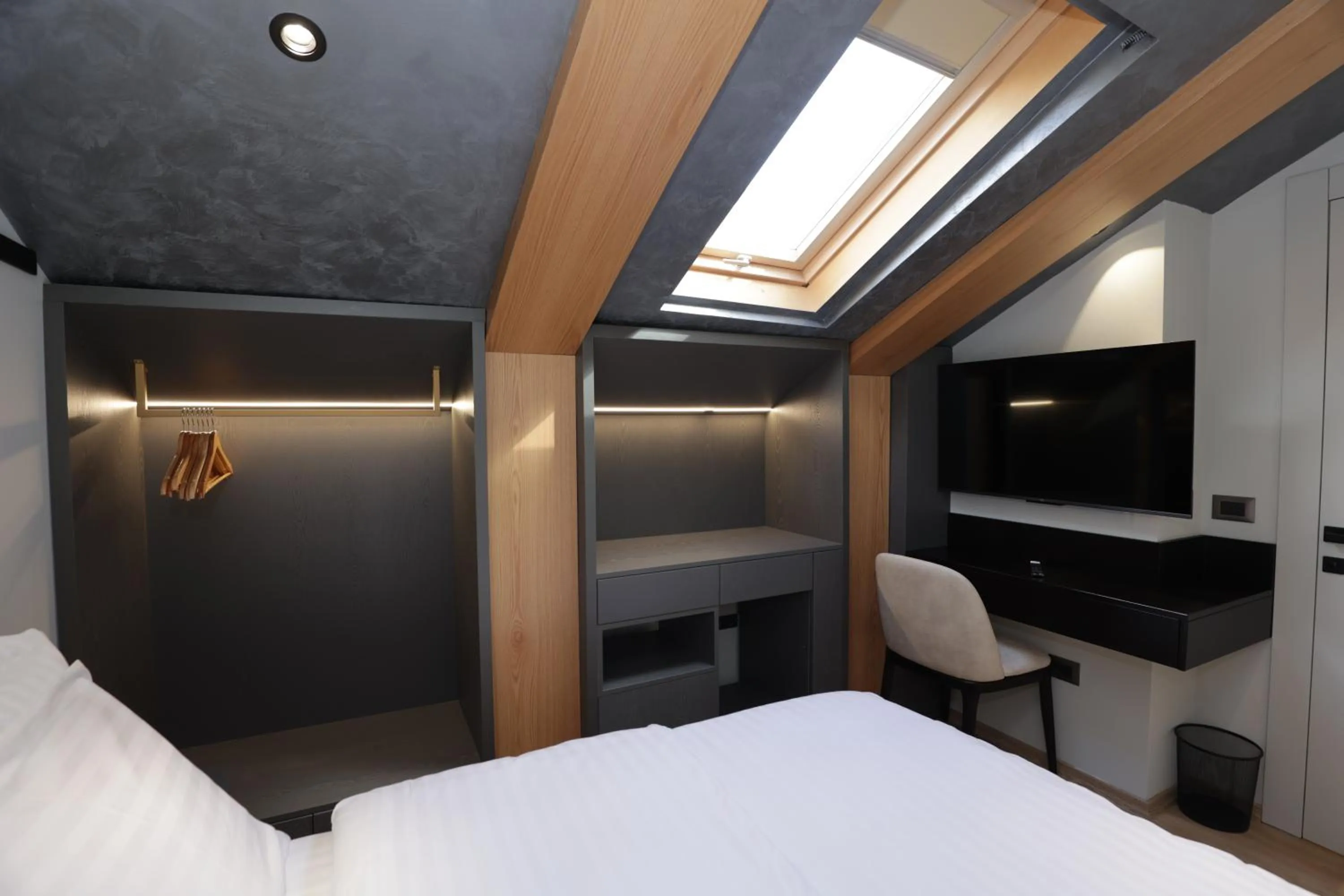 Bed in Gremmy Boutique Hotel