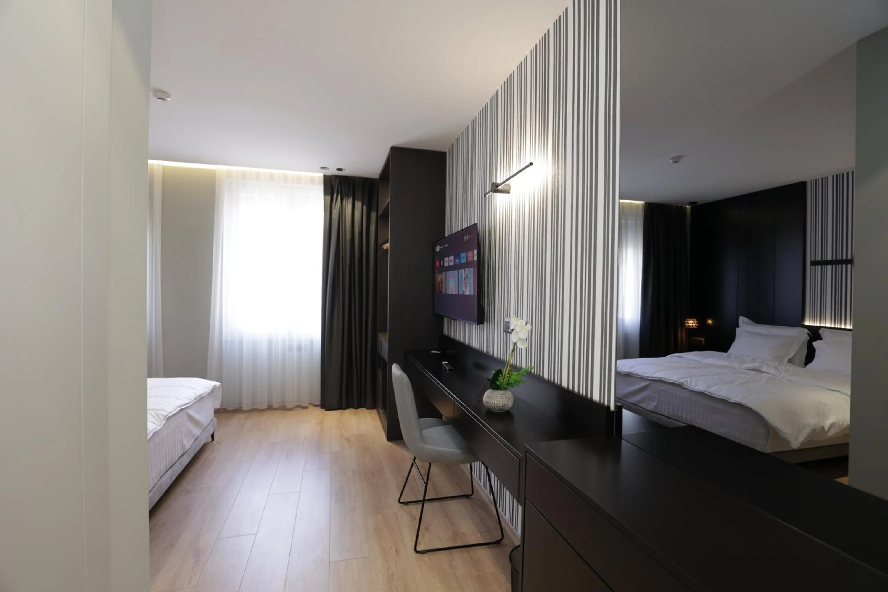 Bed in Gremmy Boutique Hotel