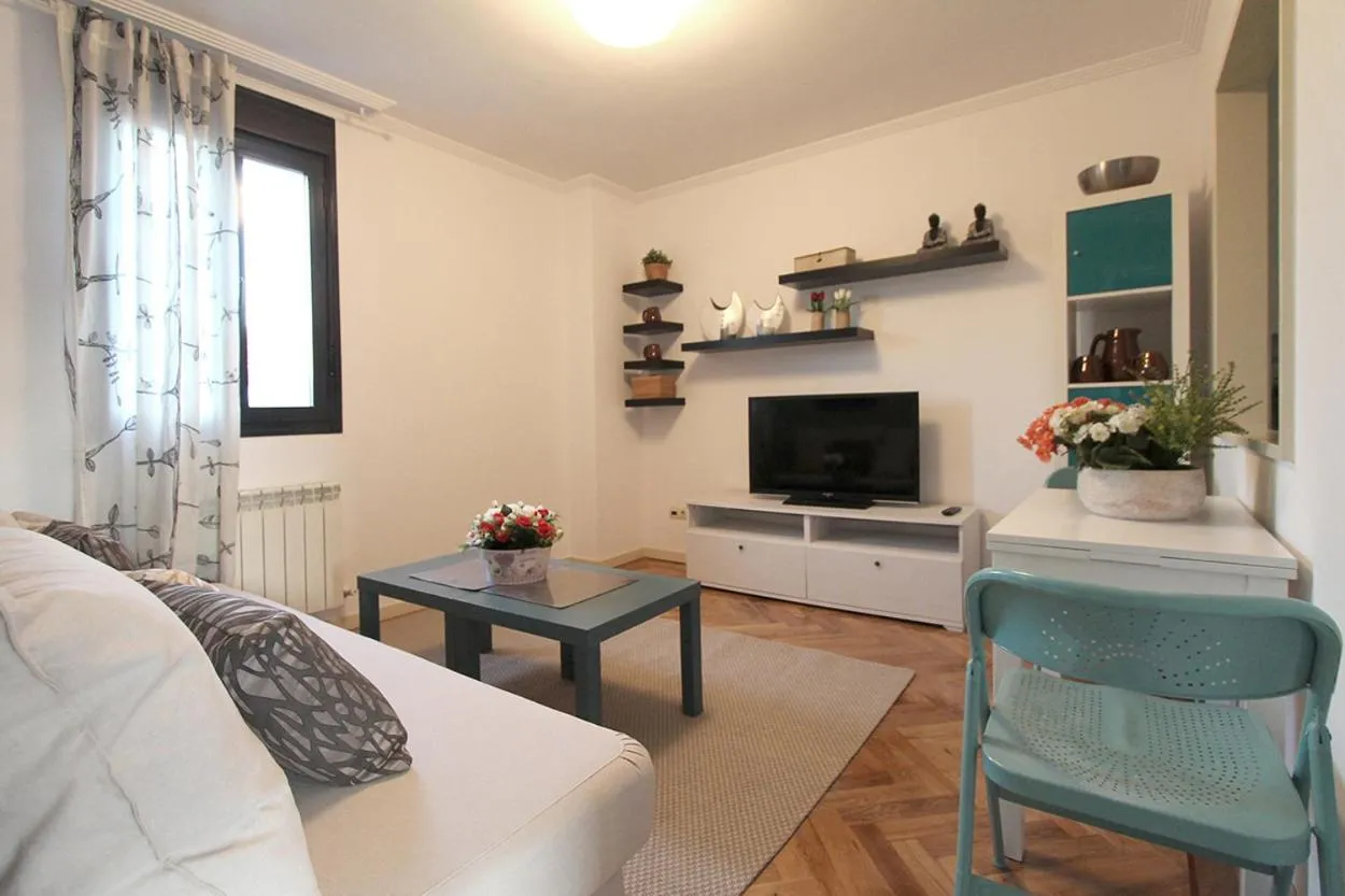 Living room in Apartamentos Cinco Rosas