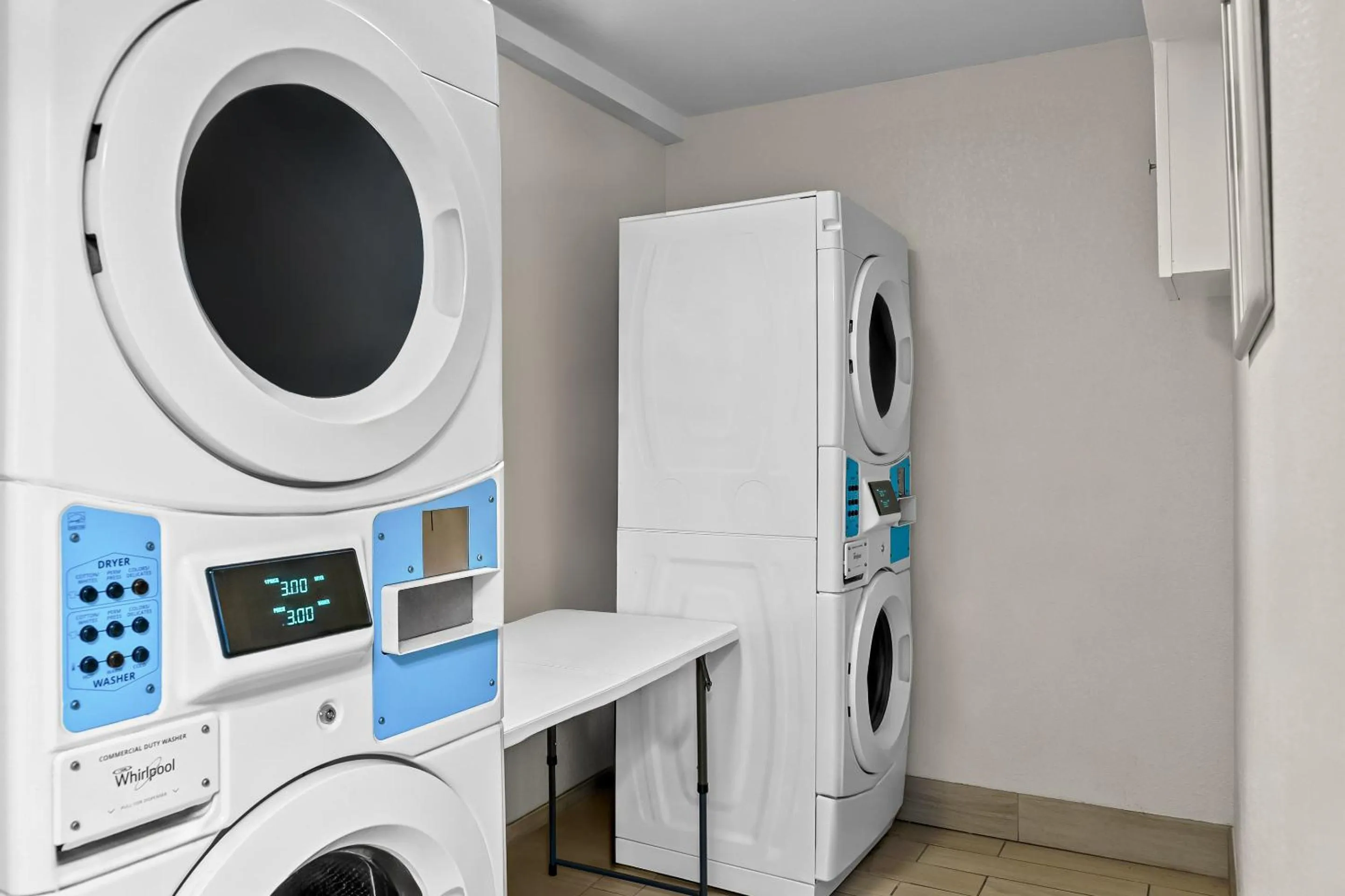 laundry in HomeTowne Studios by Red Roof Flint