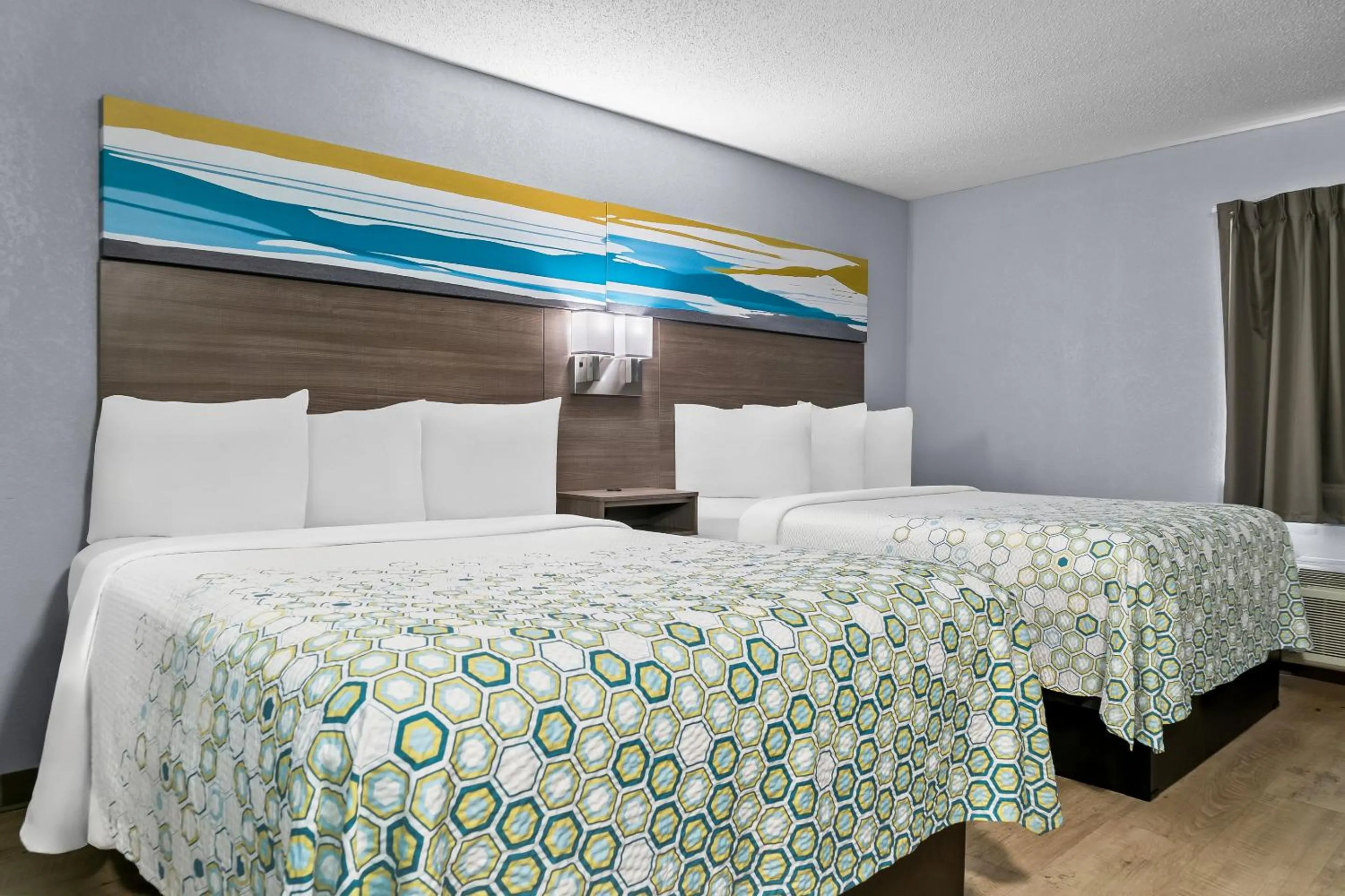 Photo of the whole room, Bed in HomeTowne Studios by Red Roof Flint