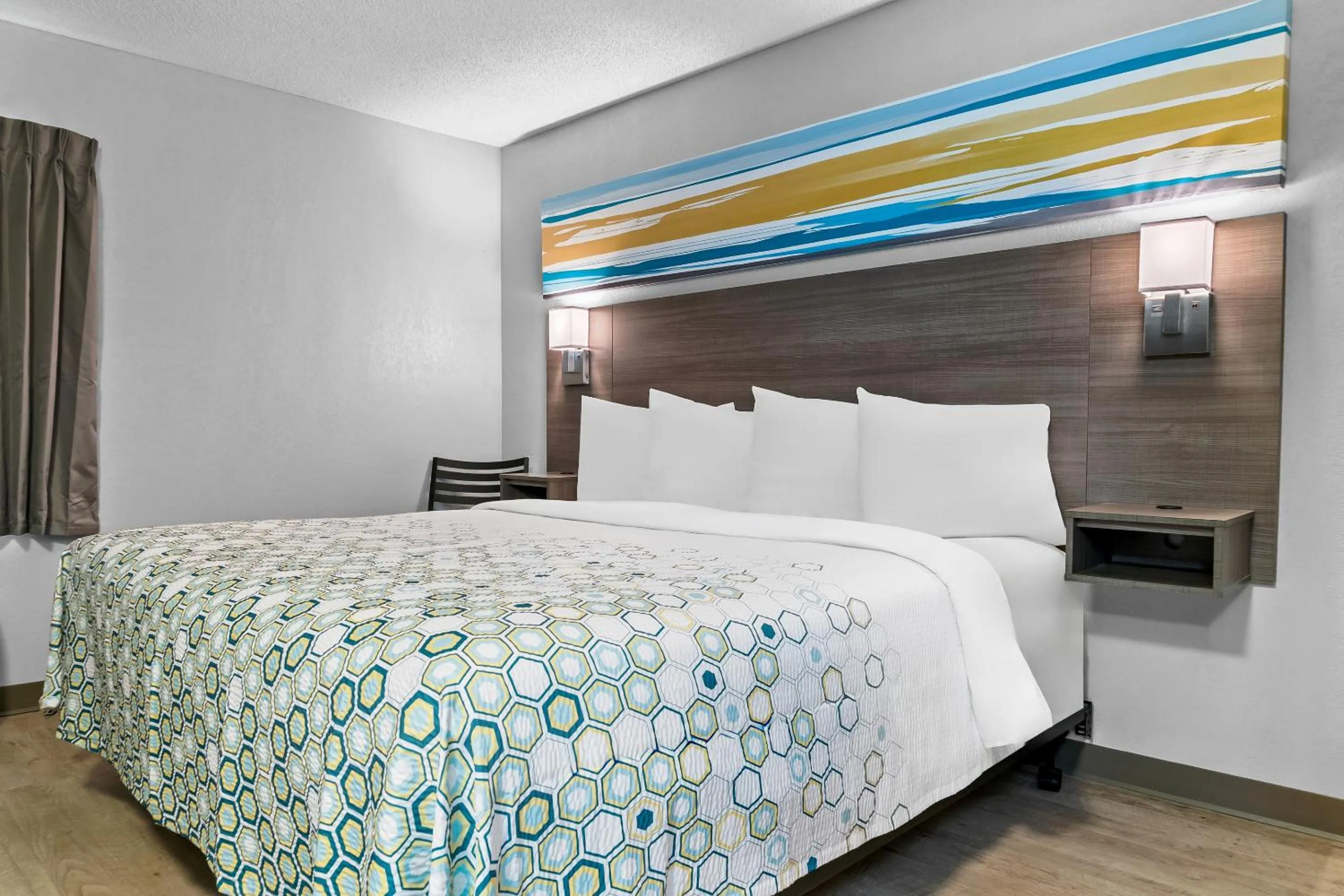 Photo of the whole room, Bed in HomeTowne Studios by Red Roof Flint