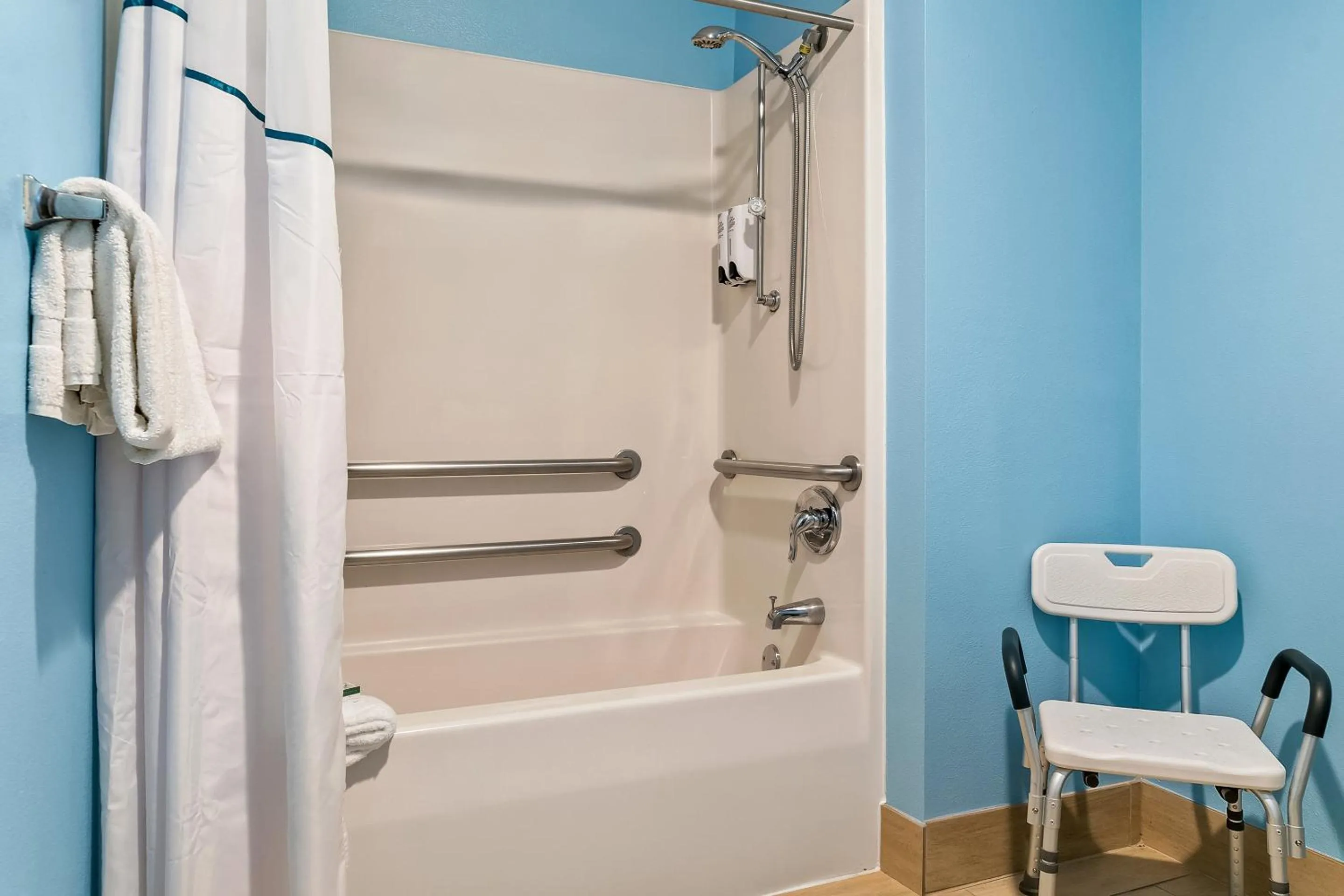 Bathroom in HomeTowne Studios by Red Roof Flint