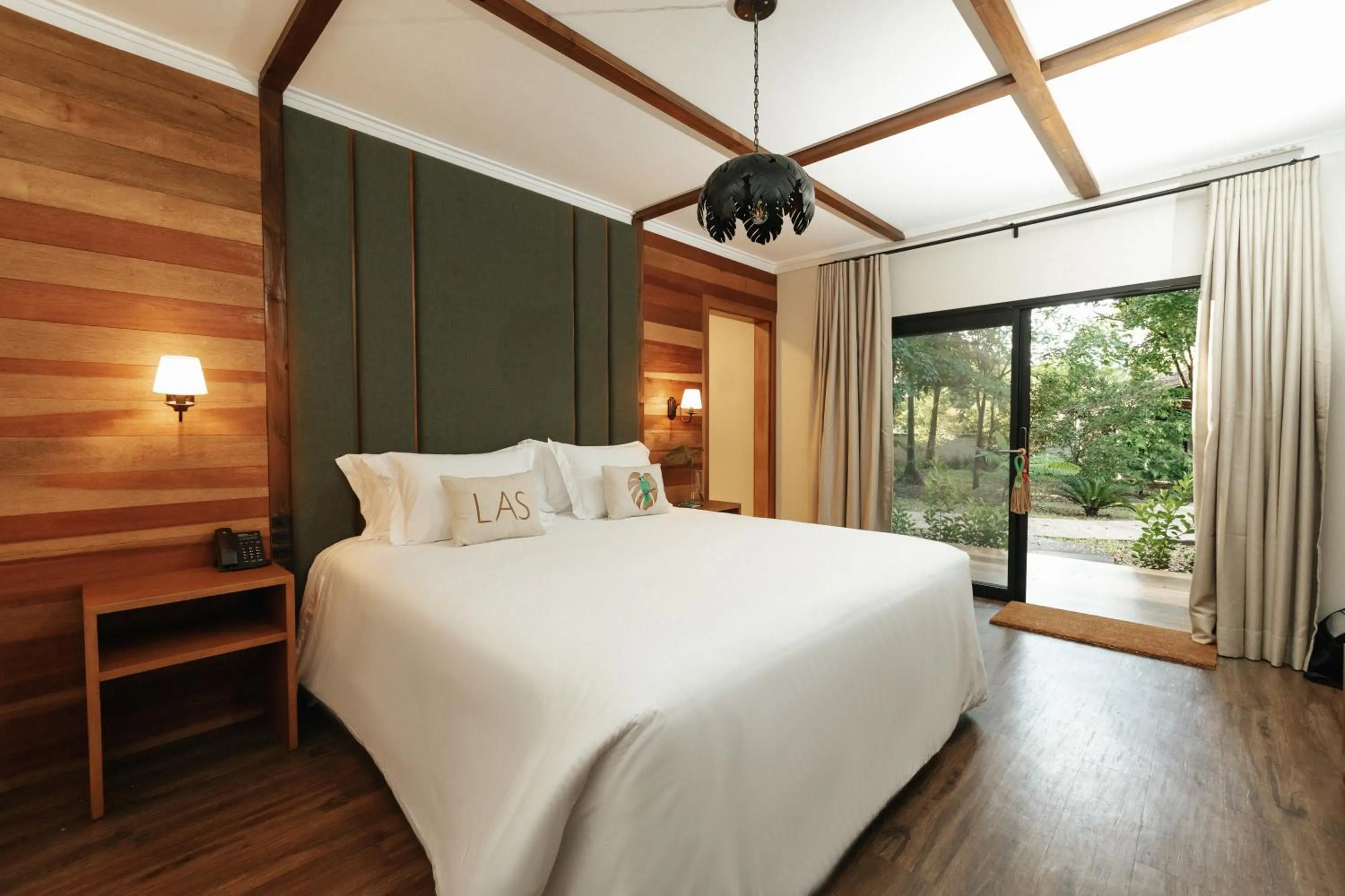 Bed in LAS HOTEL BOUTIQUE