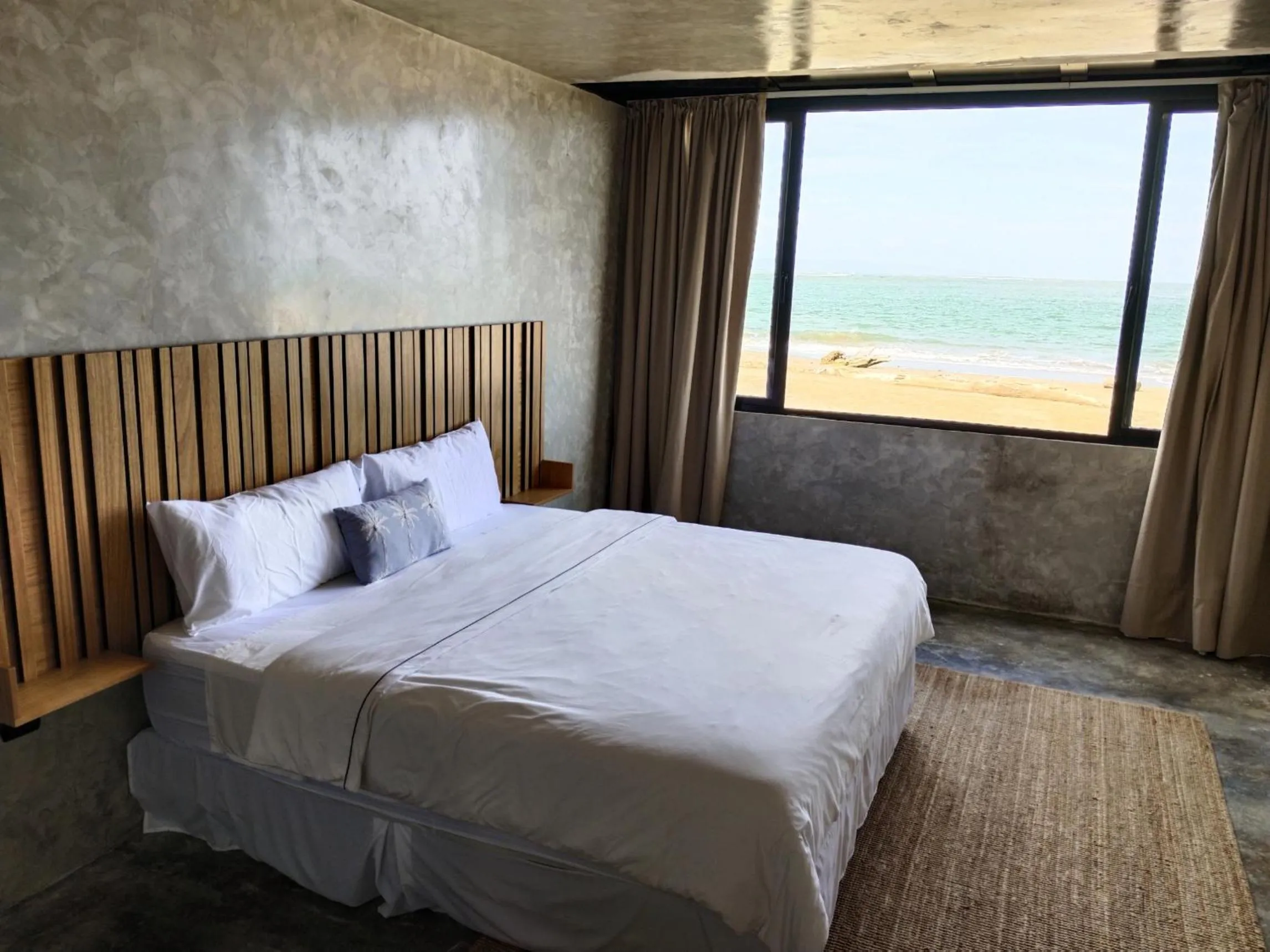 Bed in The Palm Bay Club Lodge