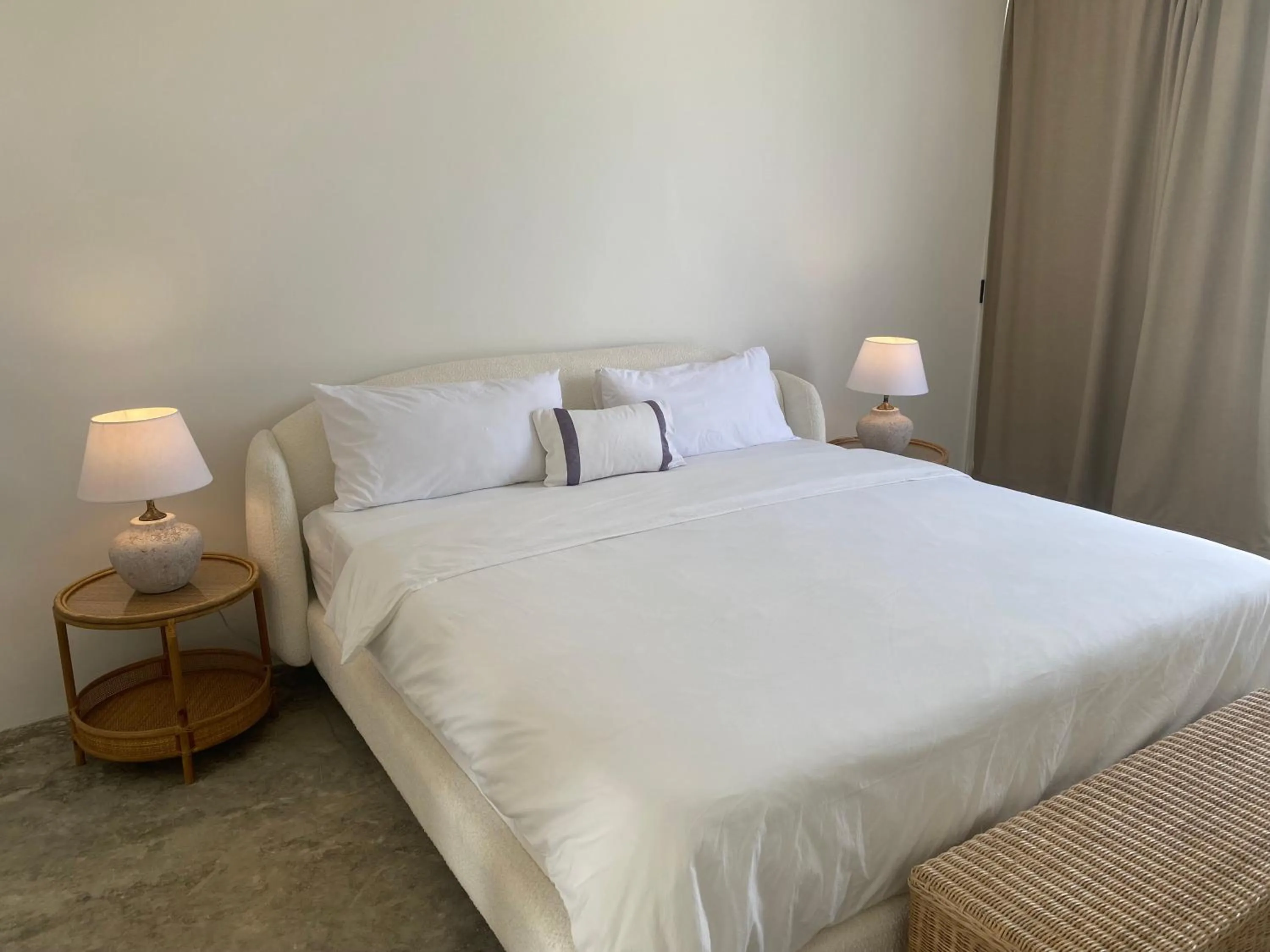 Bed in The Palm Bay Club Lodge