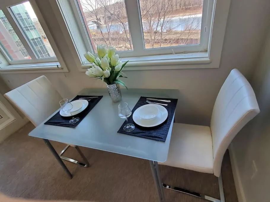 Dining area in Stunning 1 bedroom condo in Calgary with riverview