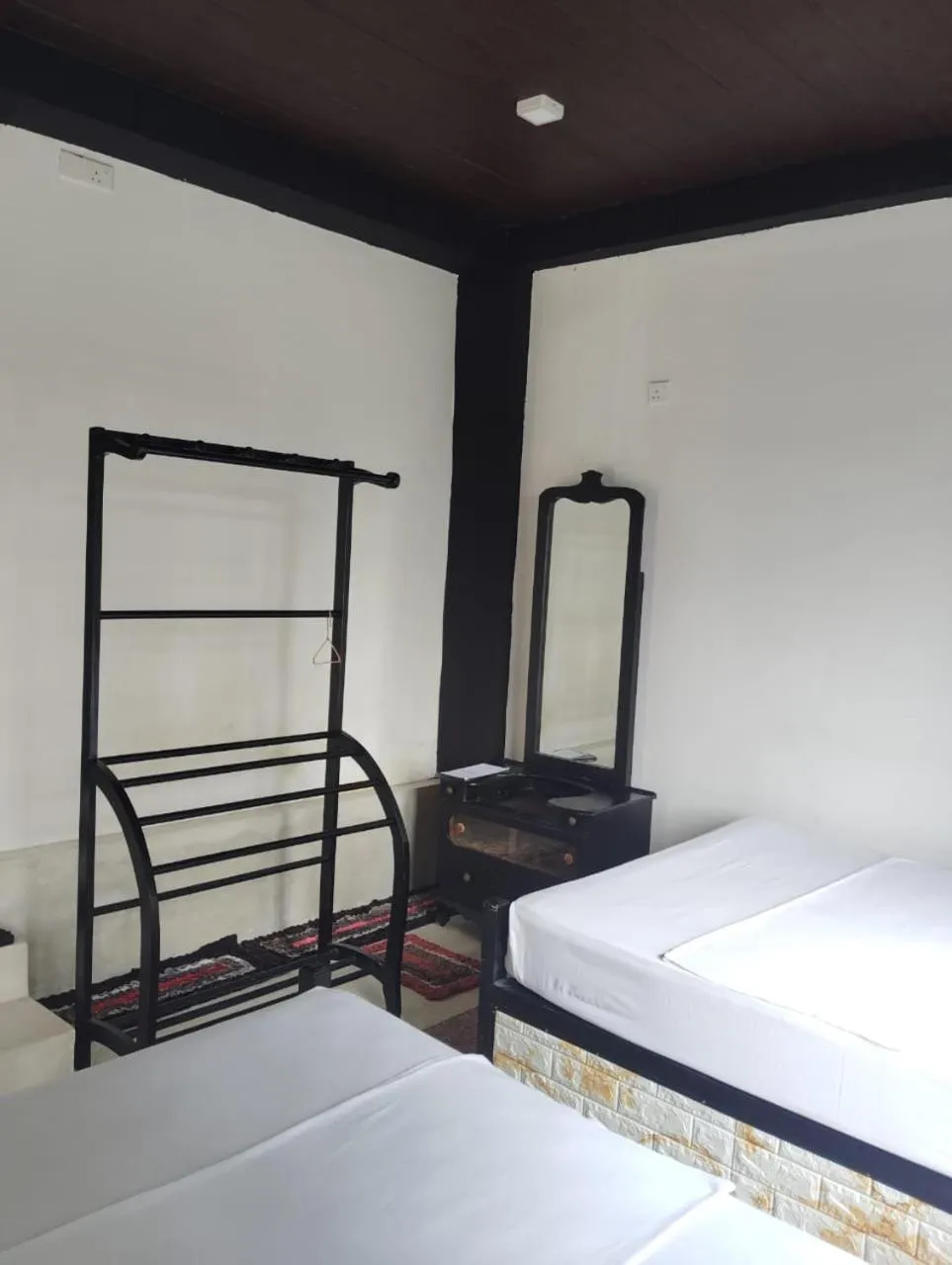 Bed in Knuckles Range Bungalow