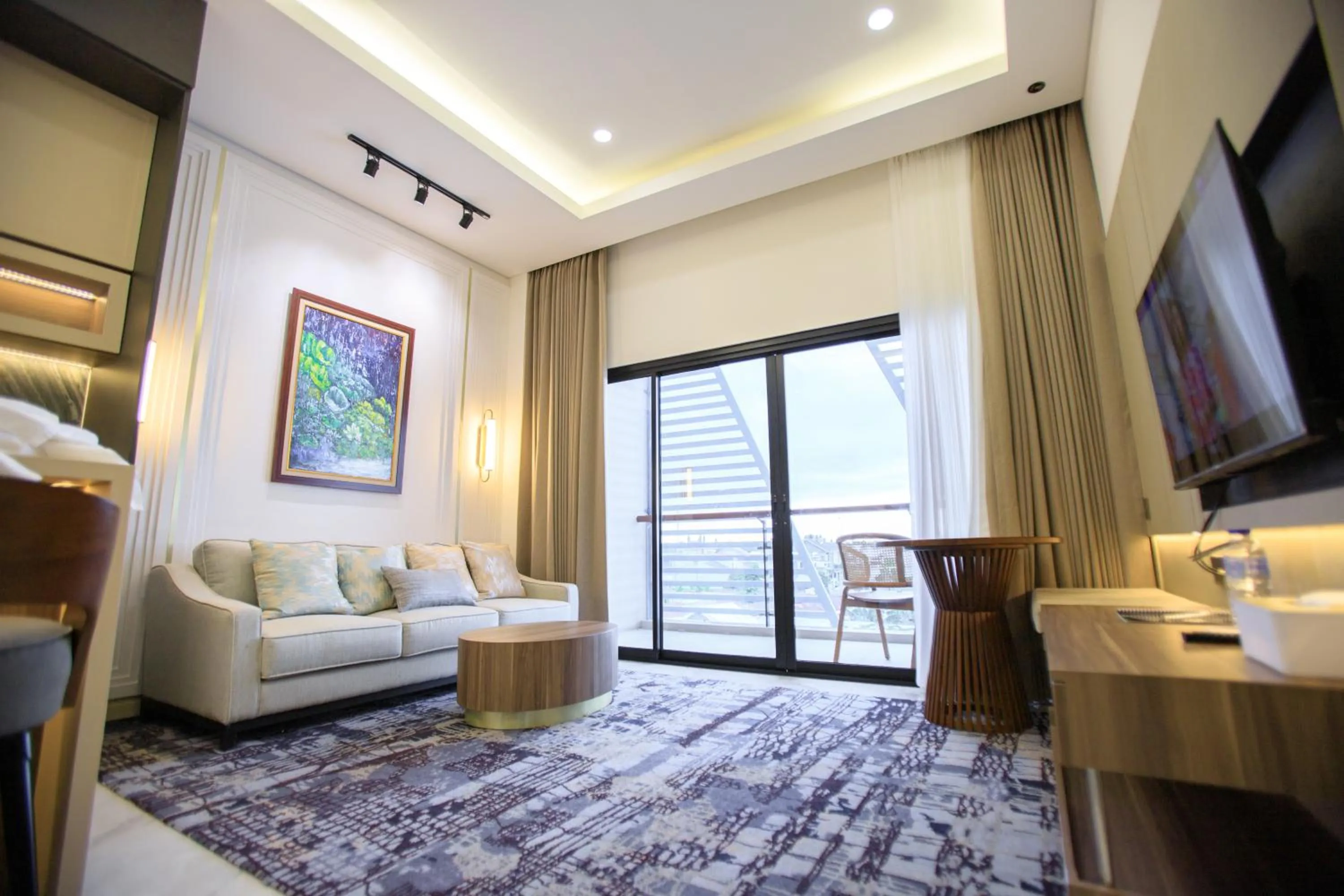 Living room, Bed in Two K Azana Style Hotel Bengkulu