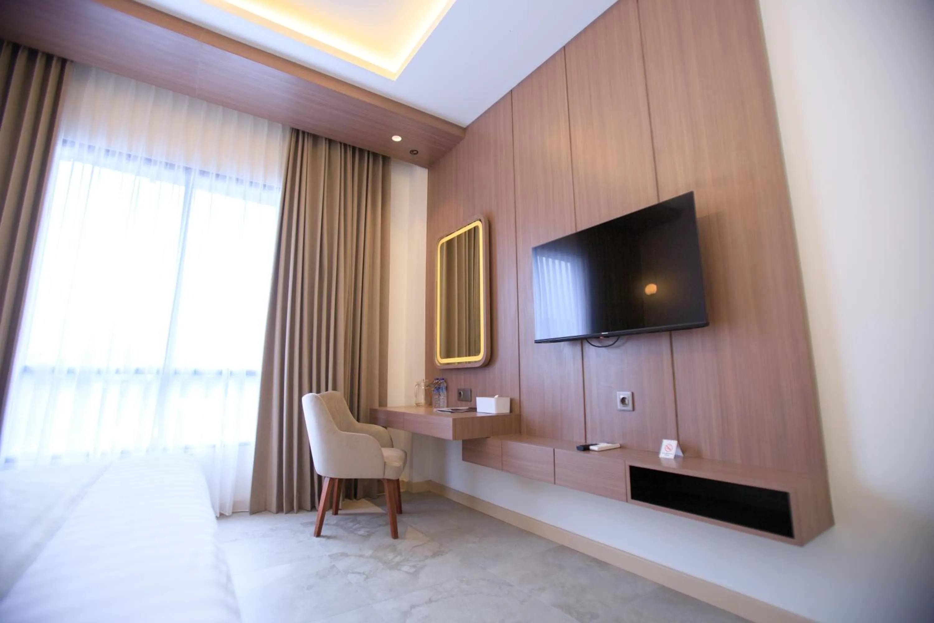 Communal lounge/ TV room in Two K Azana Style Hotel Bengkulu