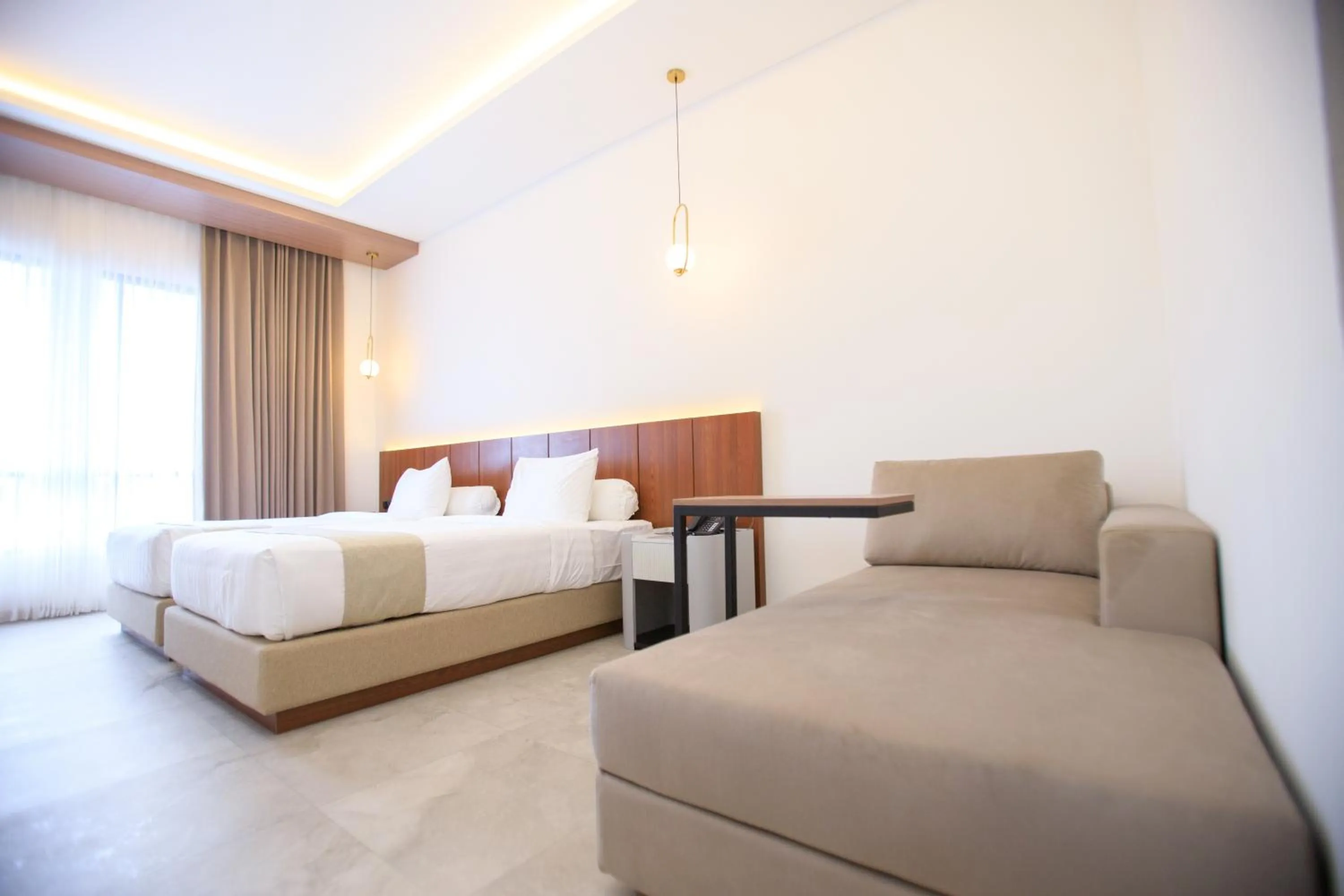 Bed in Two K Azana Style Hotel Bengkulu