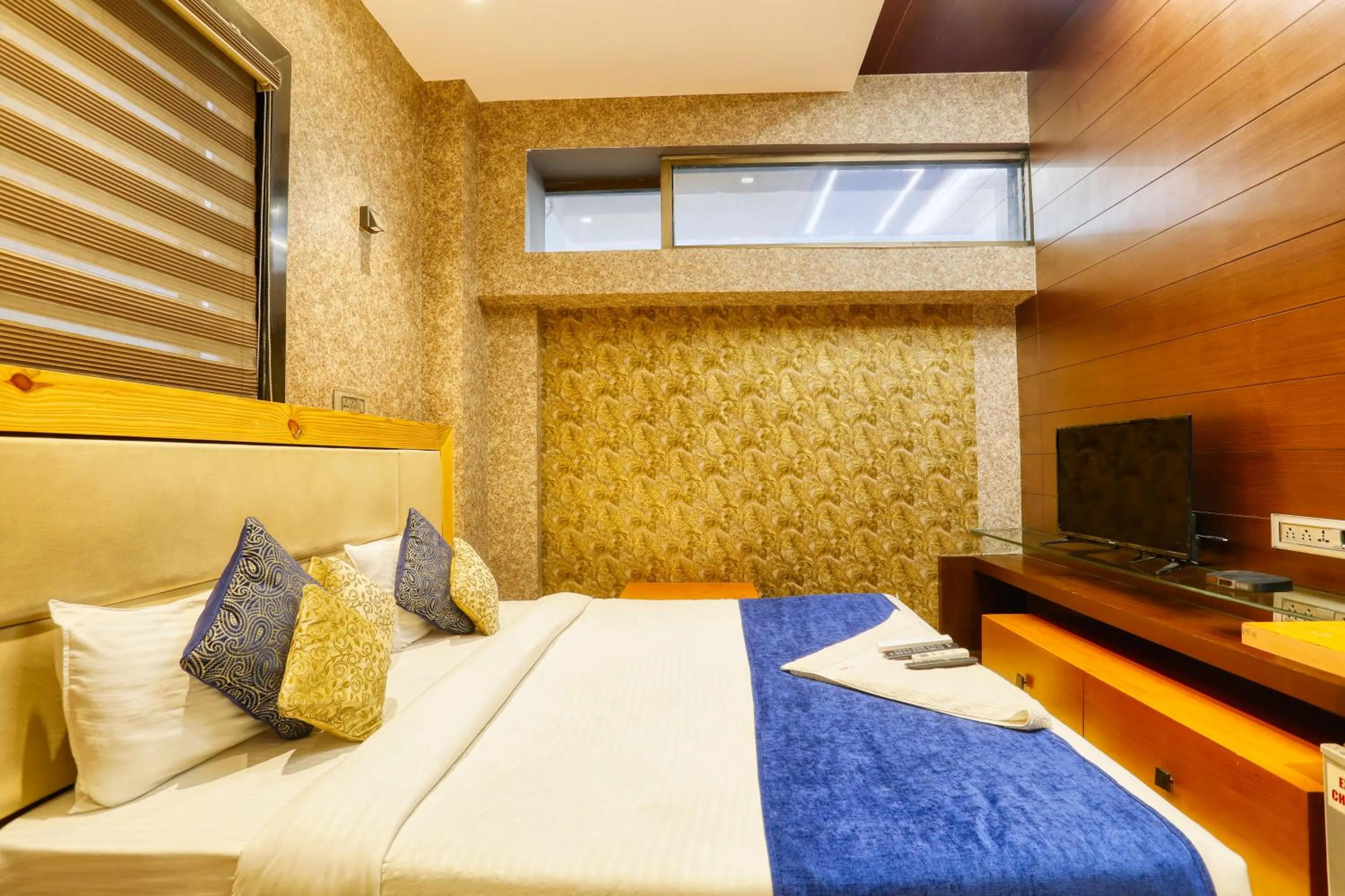 Bedroom, Bed in The Ashoka Hotel