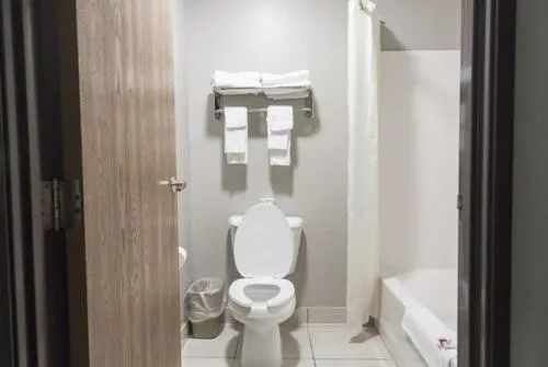 Bathroom in Super 8 by Wyndham Waxahachie TX