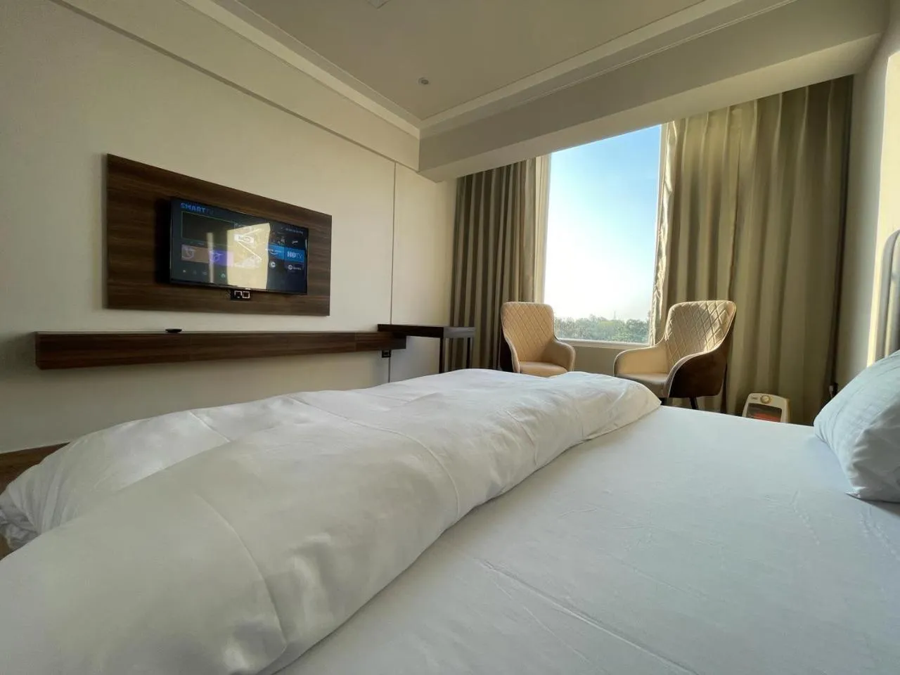 Bed in Hotel Basant Sarovar