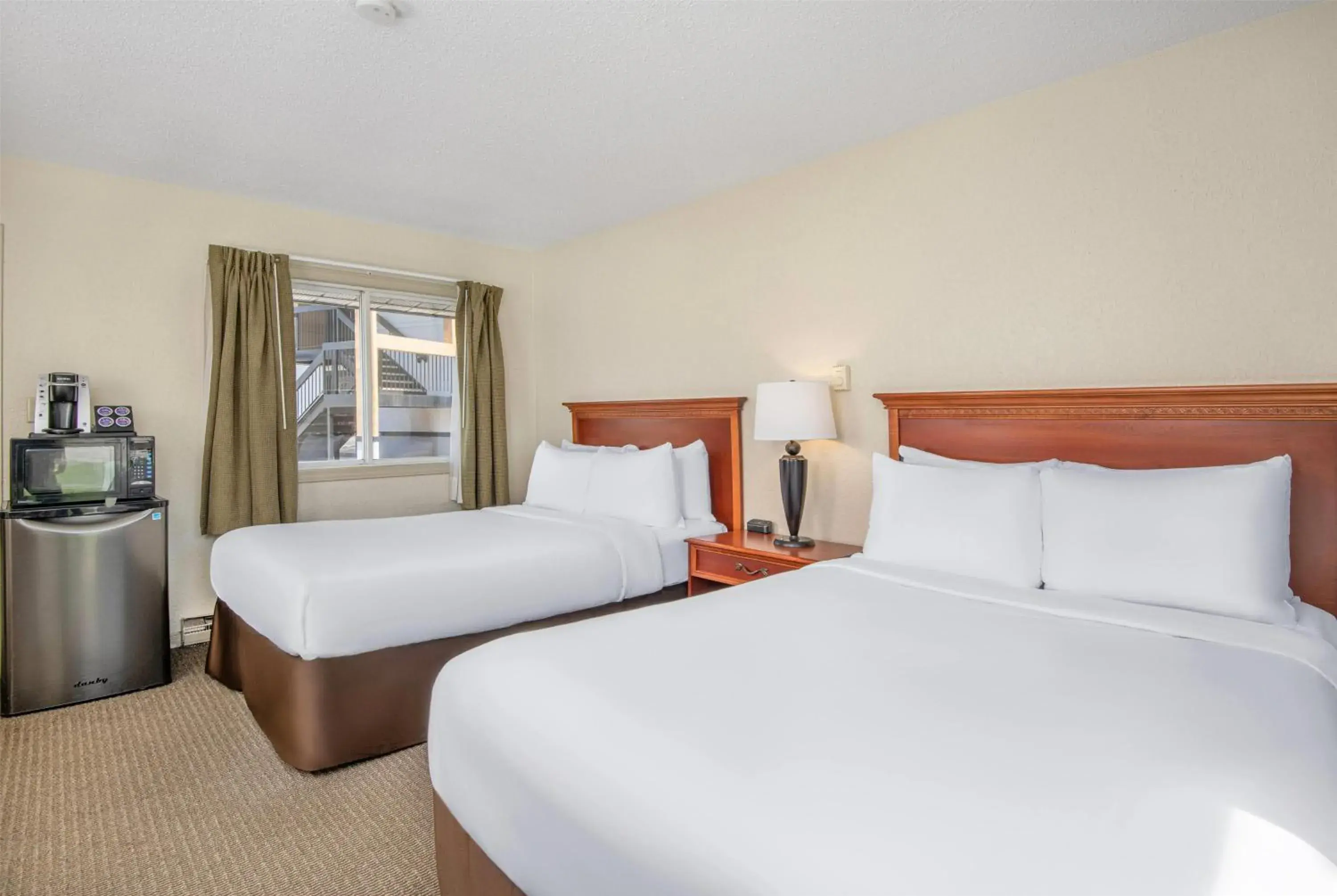 Photo of the whole room, Bed in Travelodge by Wyndham Gananoque Photo of the whole room, Bed in Travelodge by Wyndham Gananoque