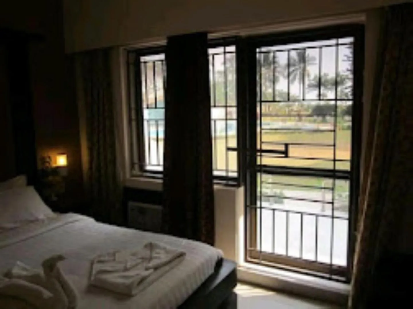 Bed in Blue Lily Beach Resort